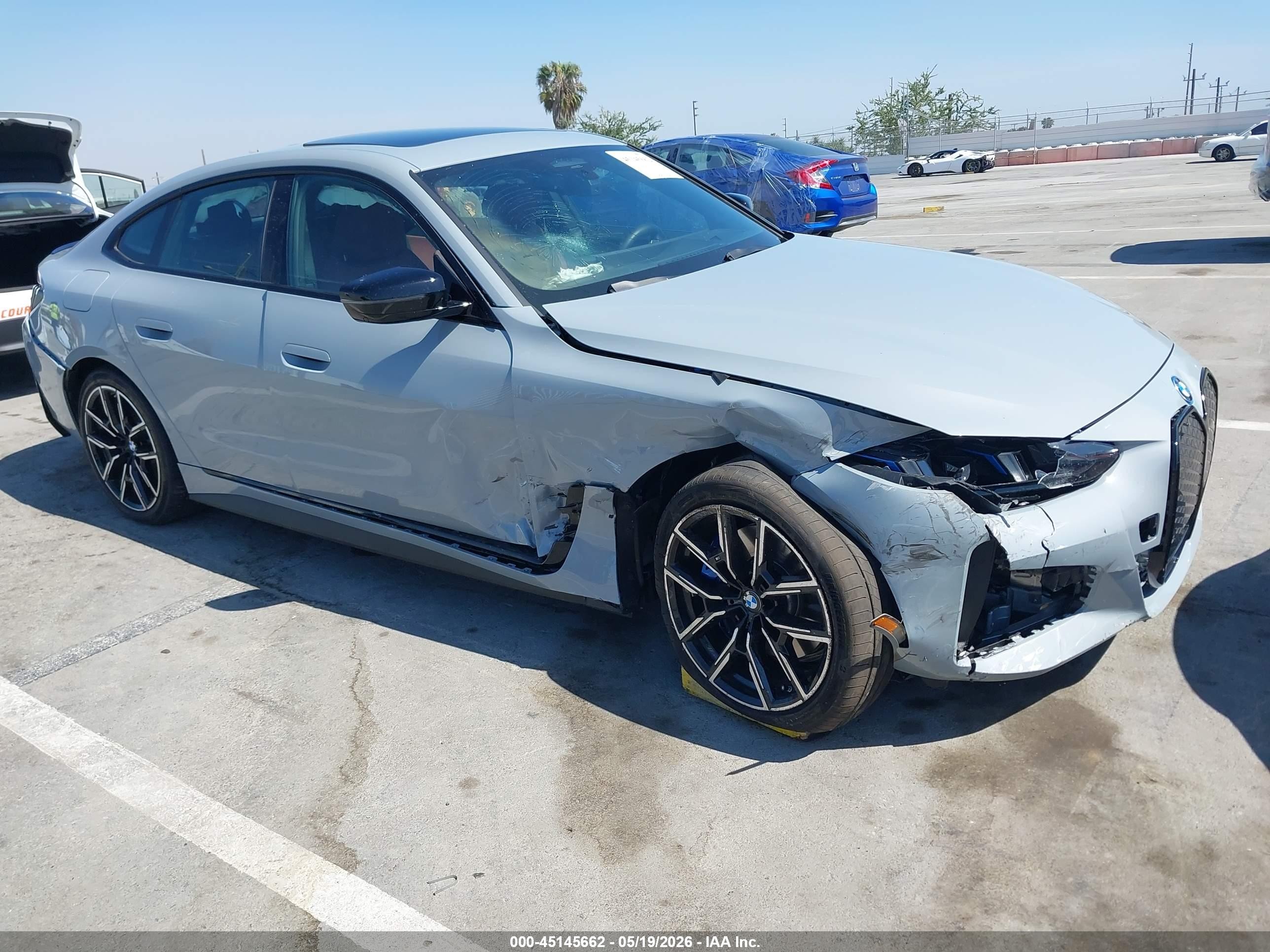 2025 BMW i4 VIN WBY23HD01SFV68040 — IAAI salvage auction photo