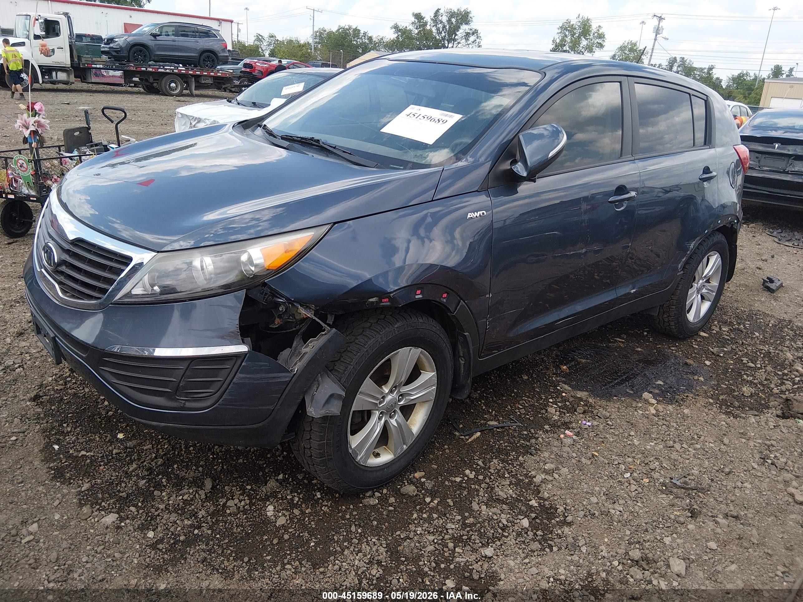 2012 Kia Sportage VIN KNDPBCA23C7310388 IAAI salvage auction — Side, Salvage (West Virginia), sold $1,650 on 2026-07-10 (photo 2)