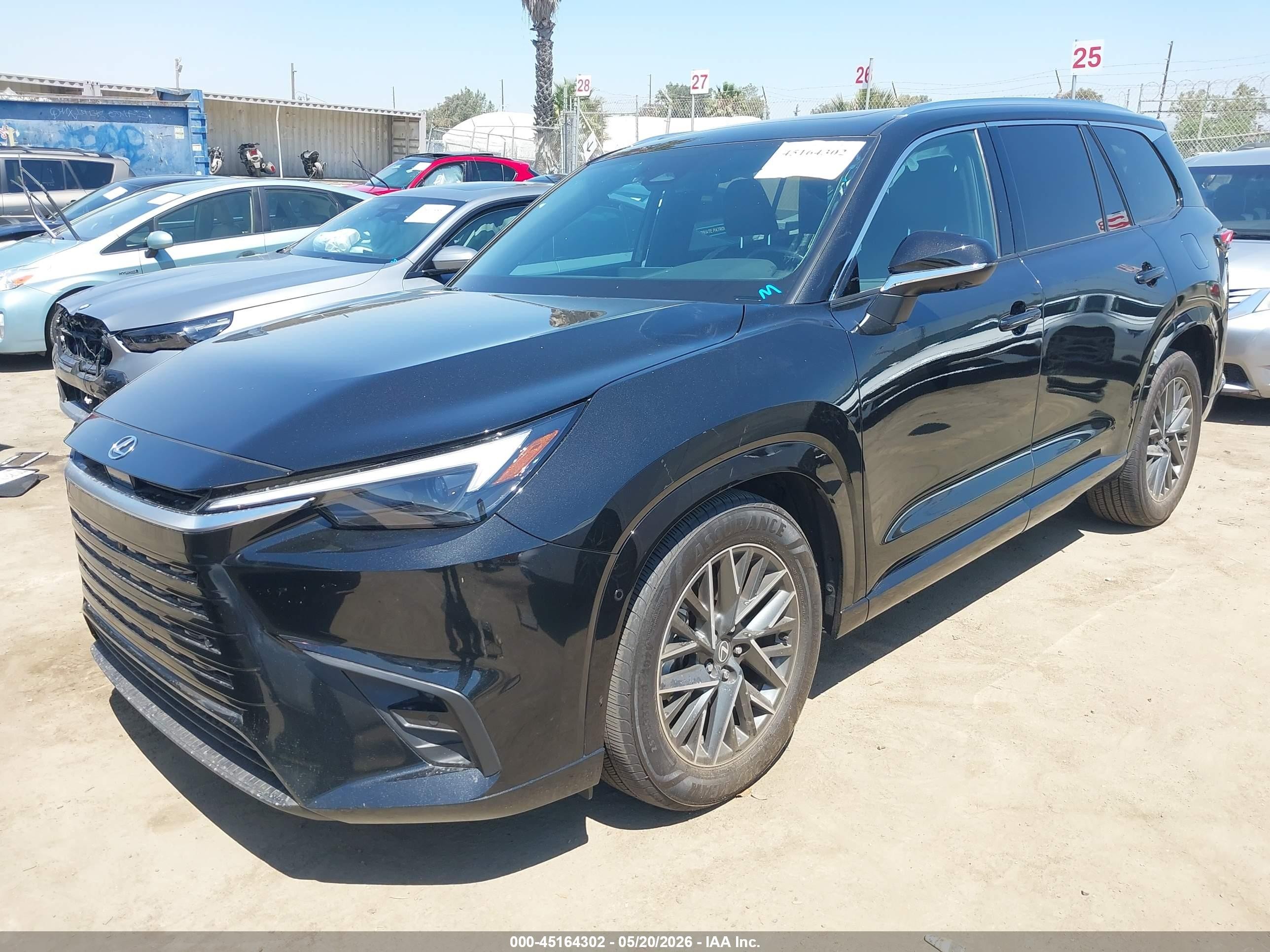 2026 Lexus Tx VIN 5TDAAAB66TS060777 IAAI salvage auction — Side, Salvage (California), sold $27,750 on 2026-08-21 (photo 2)