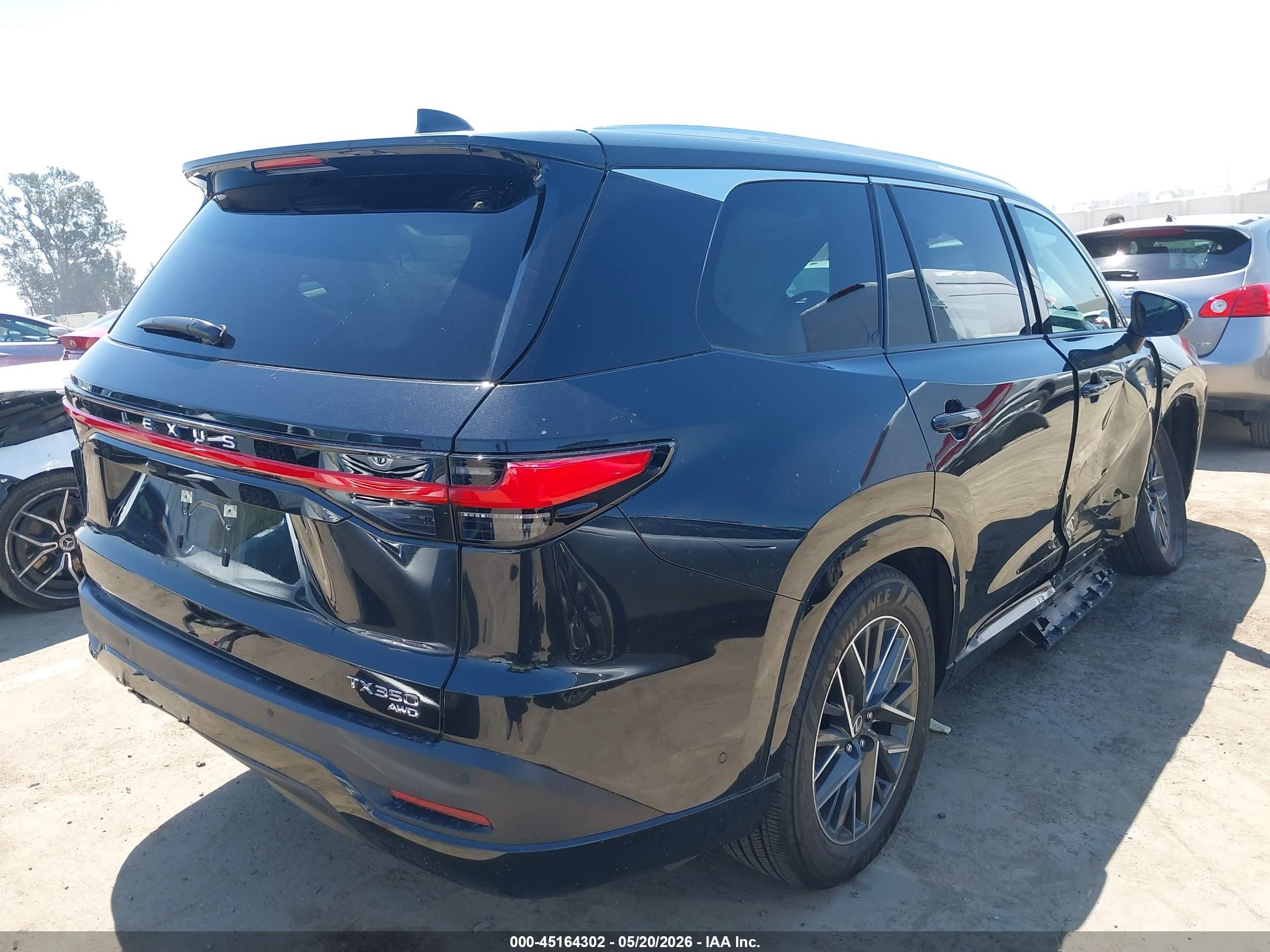 2026 Lexus Tx VIN 5TDAAAB66TS060777 IAAI salvage auction — Side, Salvage (California), sold $27,750 on 2026-08-21 (photo 4)