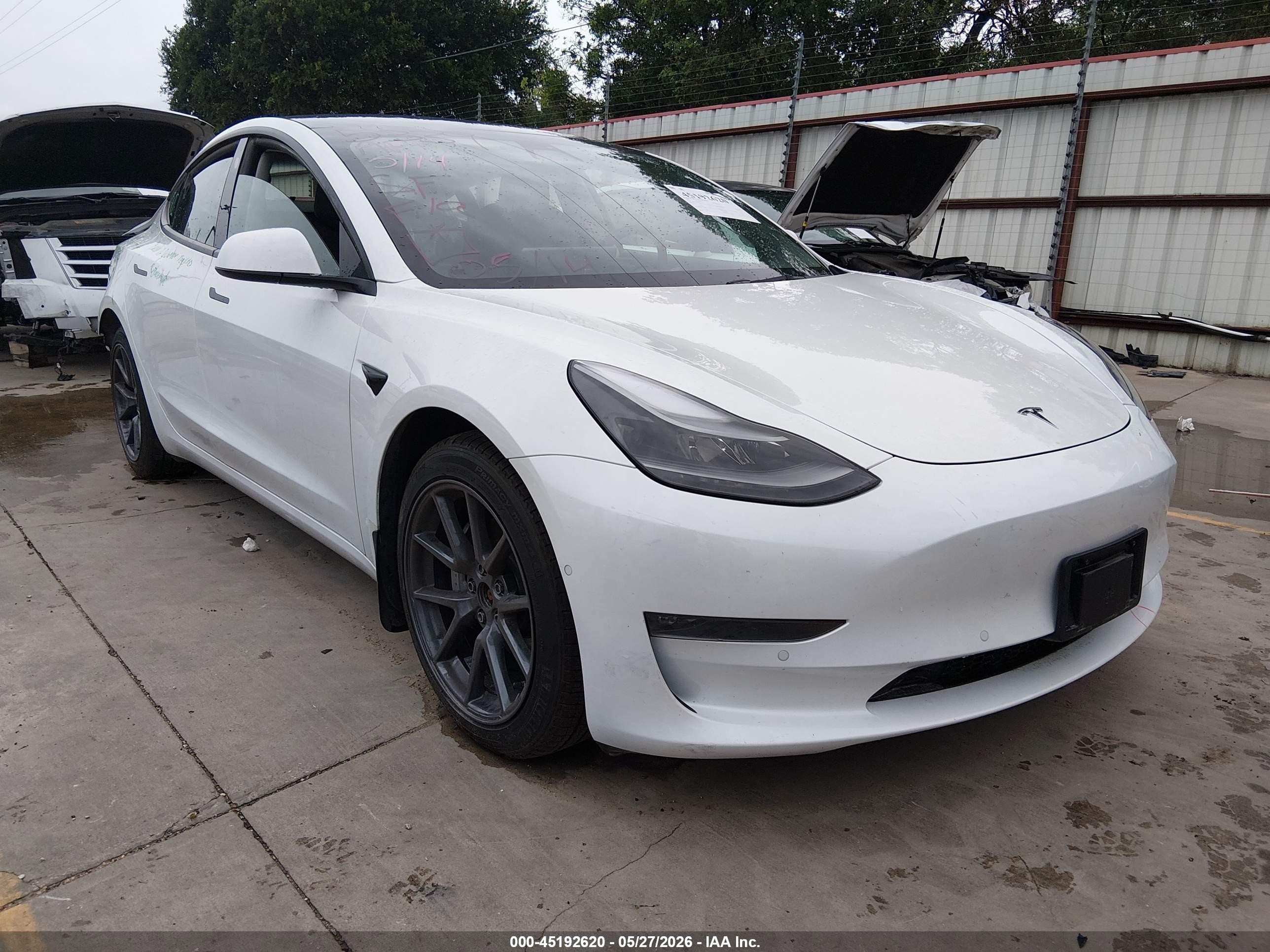2022 Tesla Model 3 VIN 5YJ3E1EB9NF118734 — IAAI salvage auction photo
