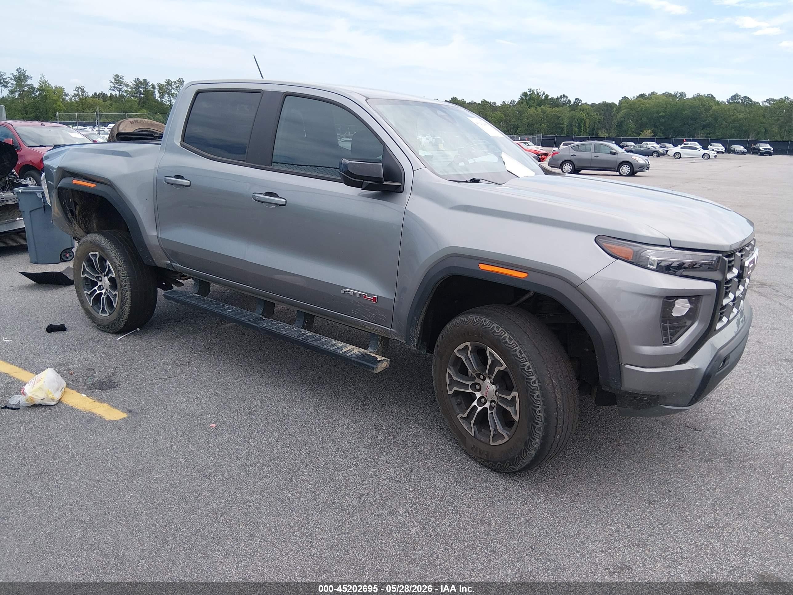2023 GMC Canyon VIN 1GTP6DEKXP1174984 — IAAI salvage auction photo