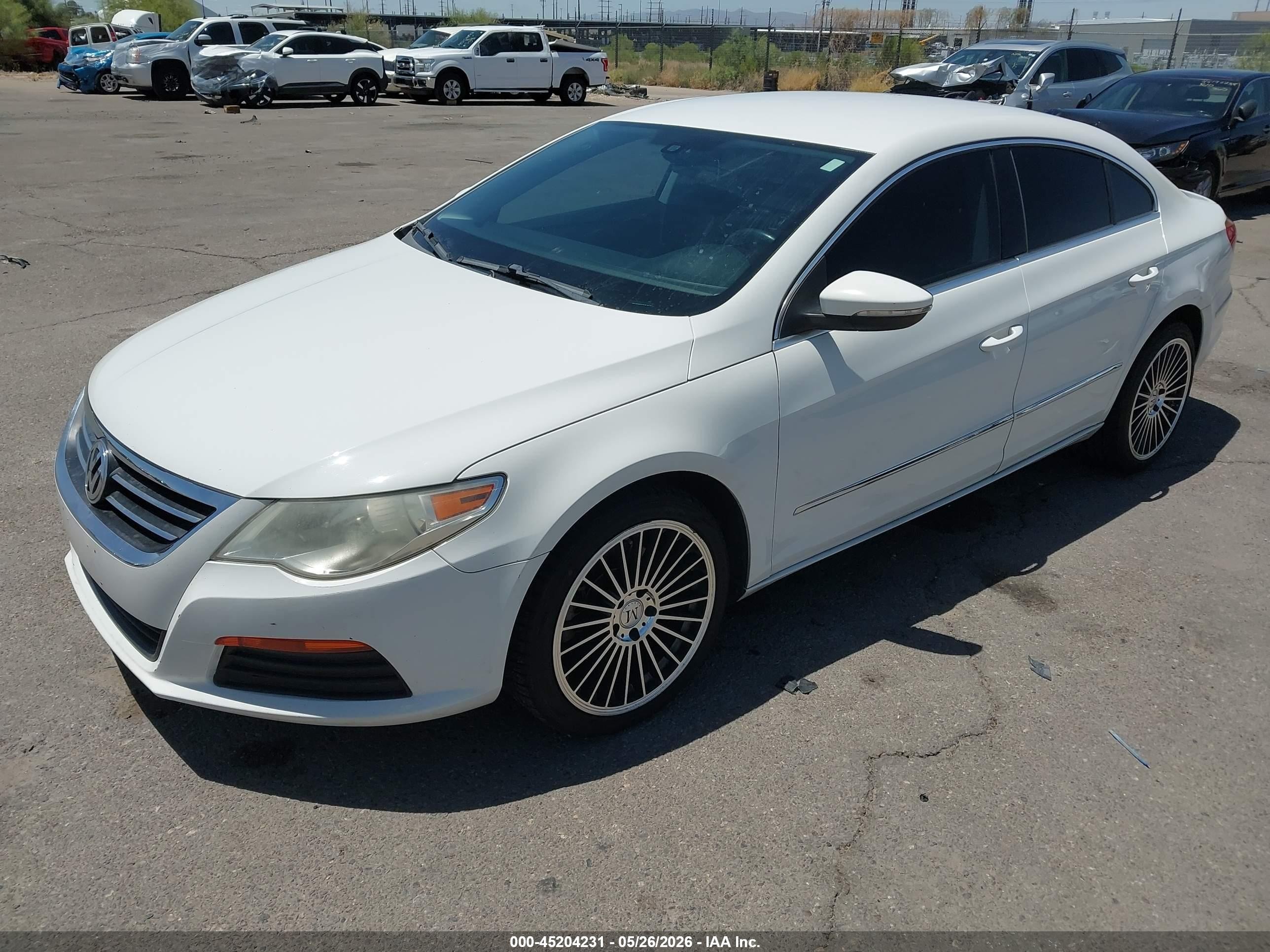 2012 Volkswagen CC VIN WVWMP7AN7CE536838 IAAI salvage auction — Side, Salvage (Arizona), sold $475 on 2026-07-09 (photo 2)