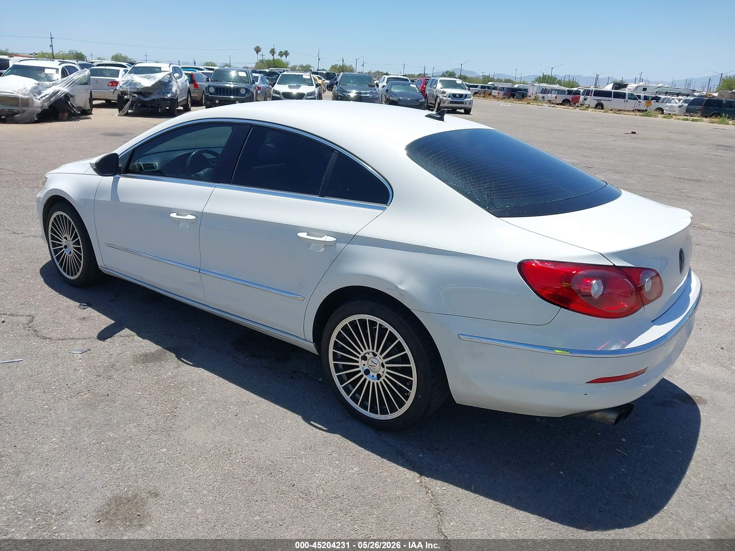 2012 Volkswagen CC VIN WVWMP7AN7CE536838 IAAI salvage auction — Side, Salvage (Arizona), sold $475 on 2026-07-09 (photo 3)