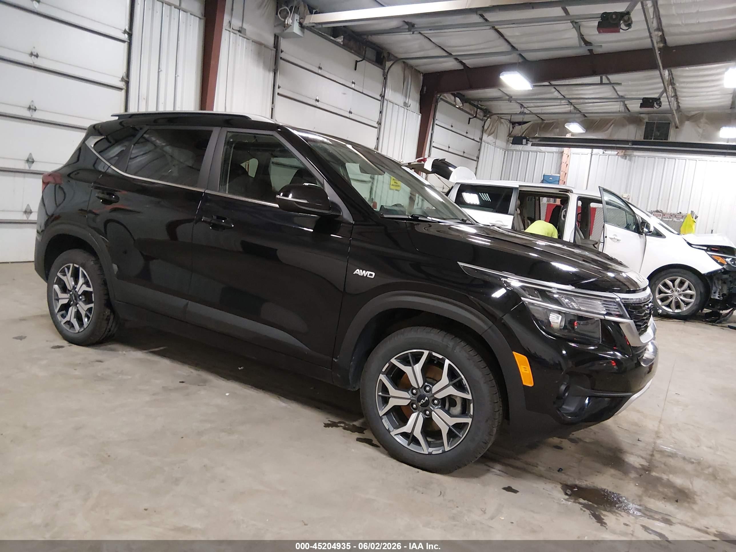 2023 Kia Seltos VIN KNDERCAAXP7352685 — IAAI salvage auction photo