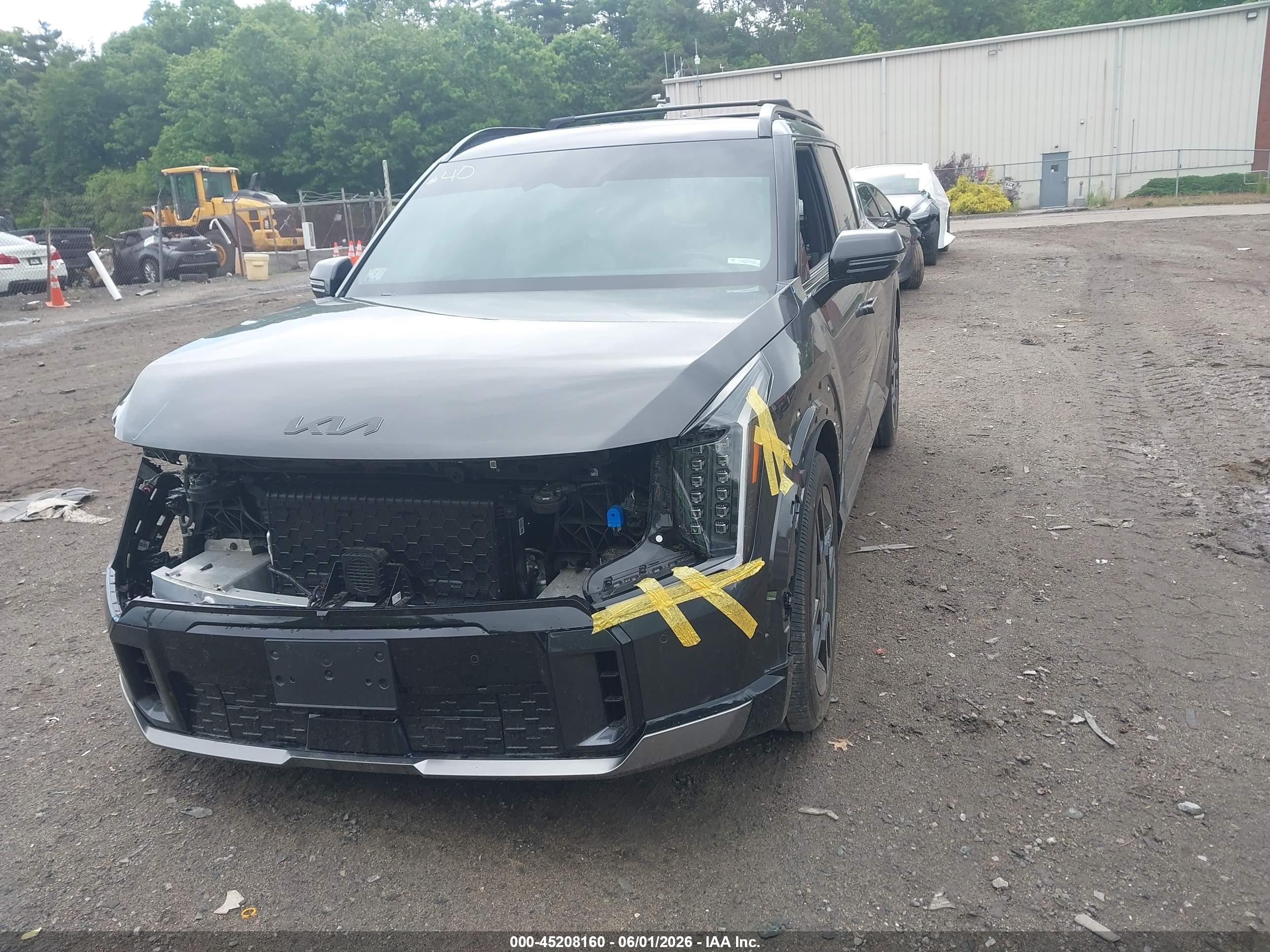 2025 Kia EV9 VIN KNDAEFS51S6054750 IAAI salvage auction — Unknown, Salvage (Massachusetts), sold $21,300 on 2026-09-13 (photo 2)