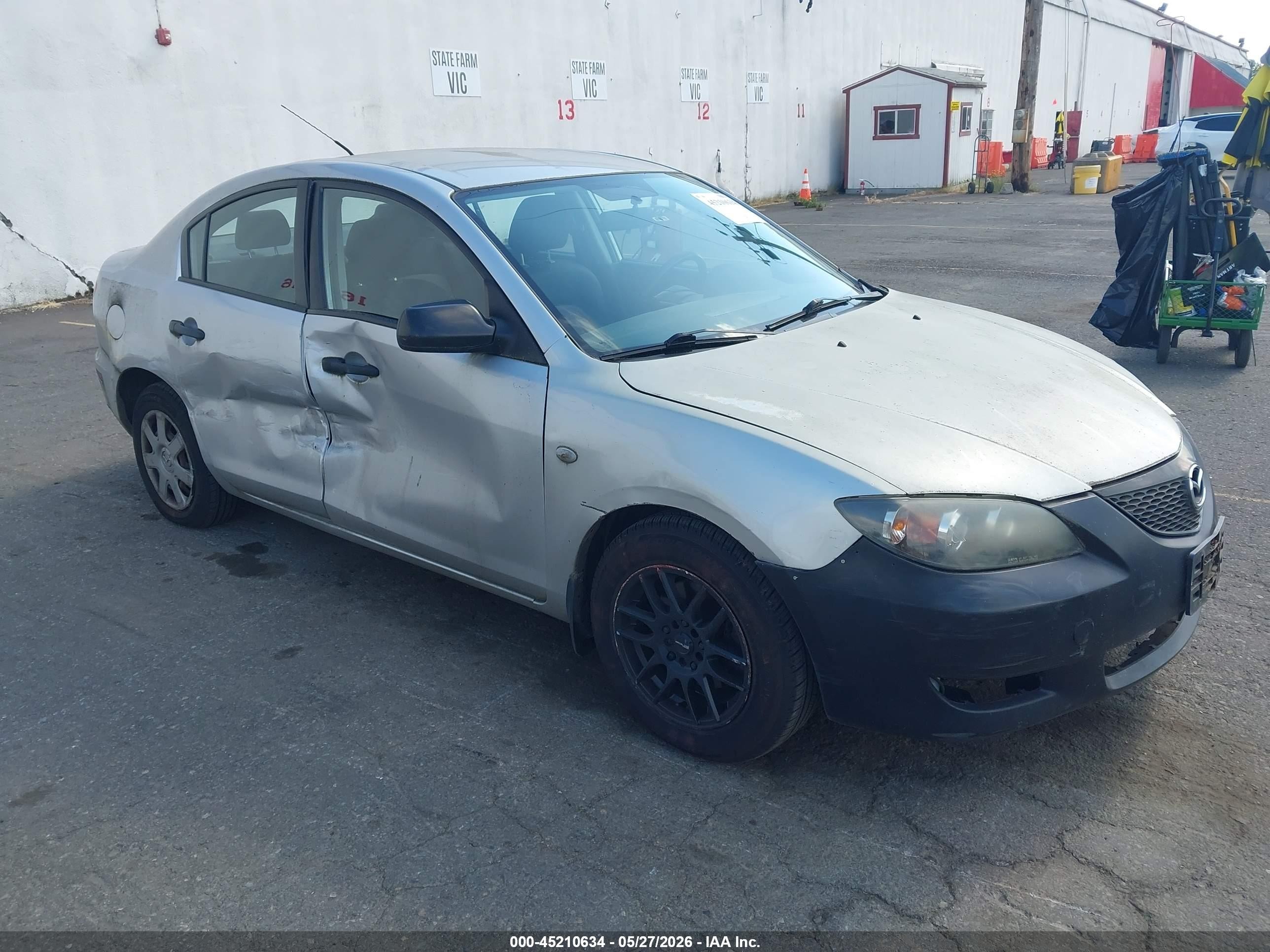 2006 Mazda 3 VIN JM1BK12F261482208 IAAI salvage auction — Side, Salvage (Oregon), sold $100 on 2026-07-09 (photo 1)