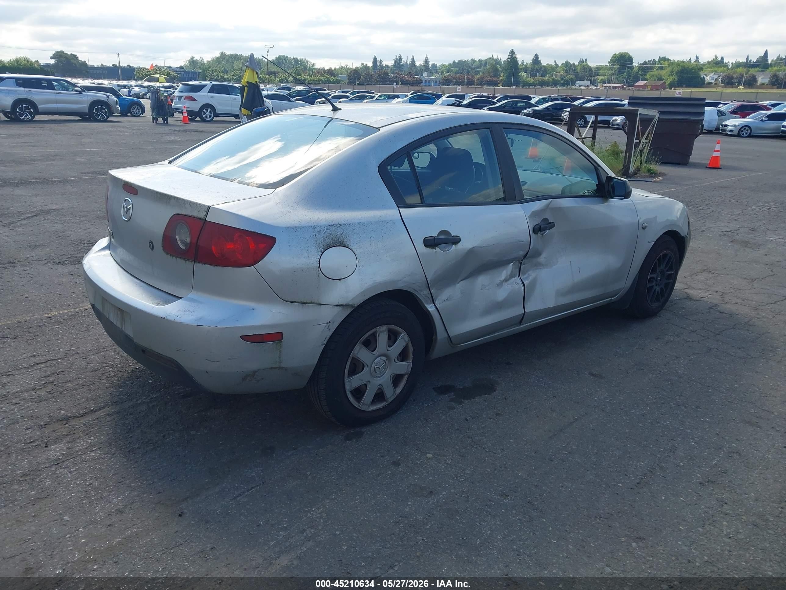 2006 Mazda 3 VIN JM1BK12F261482208 IAAI salvage auction — Side, Salvage (Oregon), sold $100 on 2026-07-09 (photo 4)