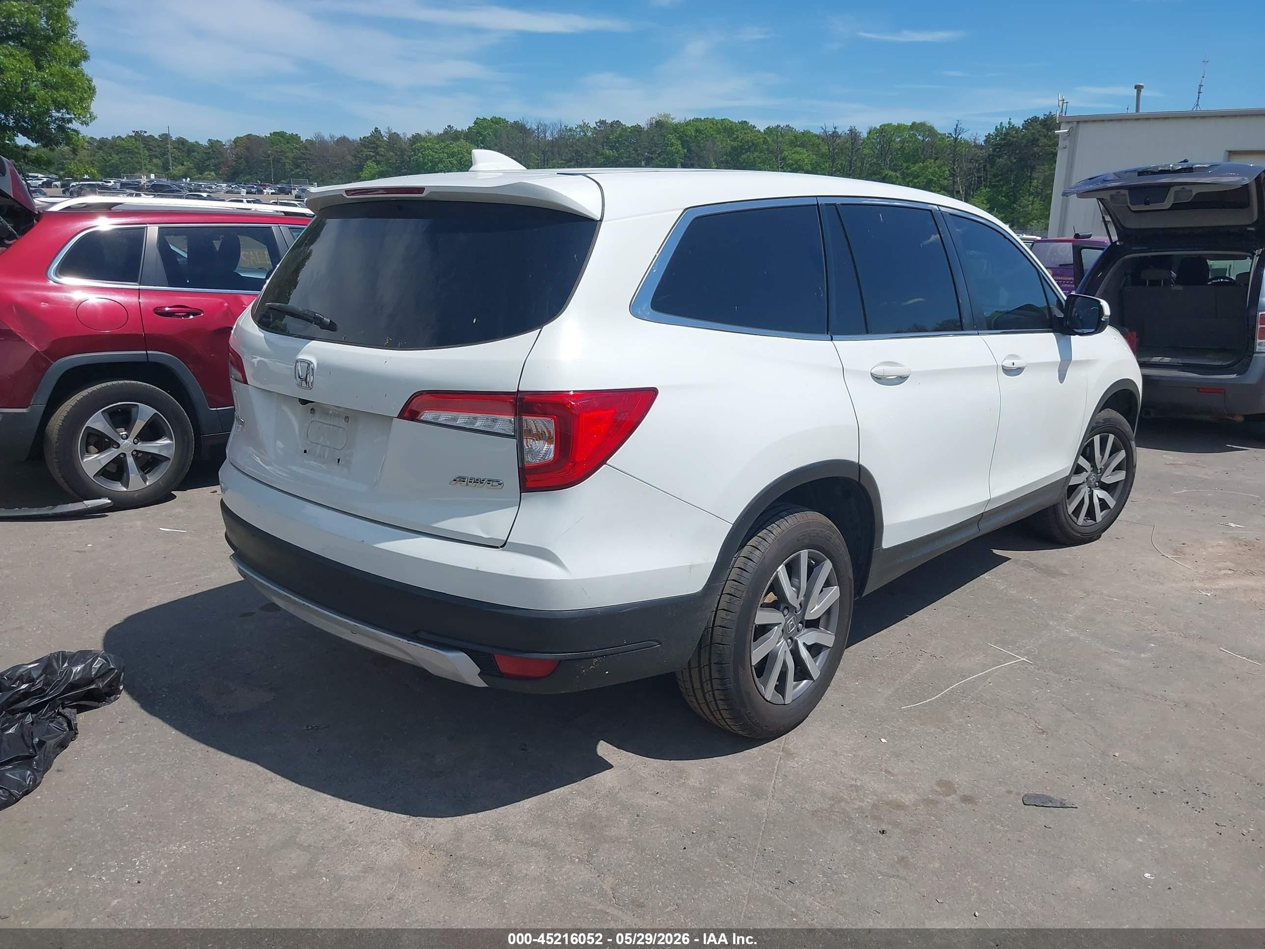 2020 Honda Pilot VIN 5FNYF6H34LB055060 IAAI salvage auction — Water/Flood, Mv-907A (New York), sold $5,600 on 2026-09-14 (photo 4)