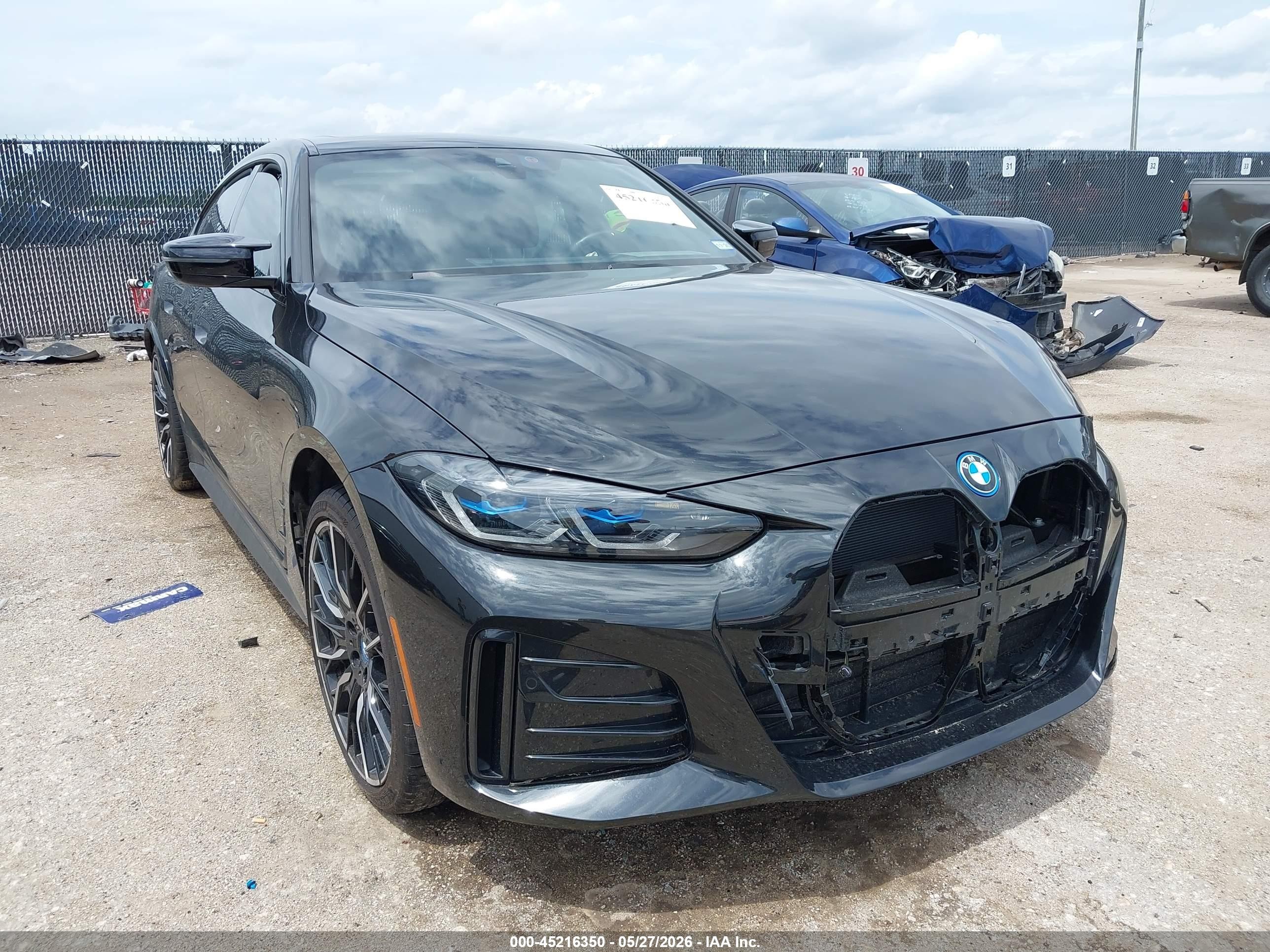 2024 BMW i4 VIN WBY33AW09RFR61898 — IAAI salvage auction photo