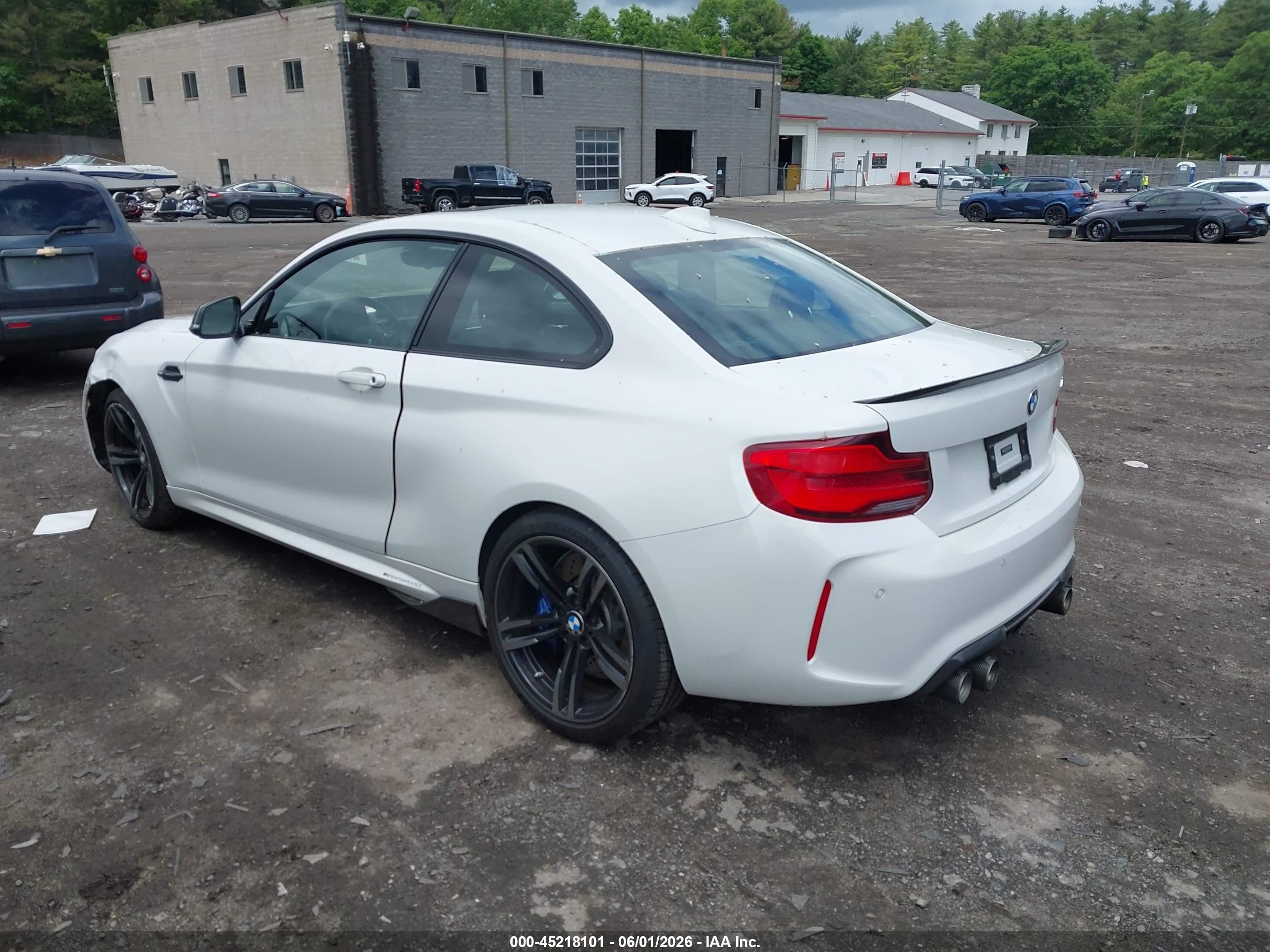 2018 BMW M2 VIN WBS1J5C58JVE51747 IAAI salvage auction — Side, Salvage (Massachusetts), sold $18,200 on 2026-08-27 (photo 3)