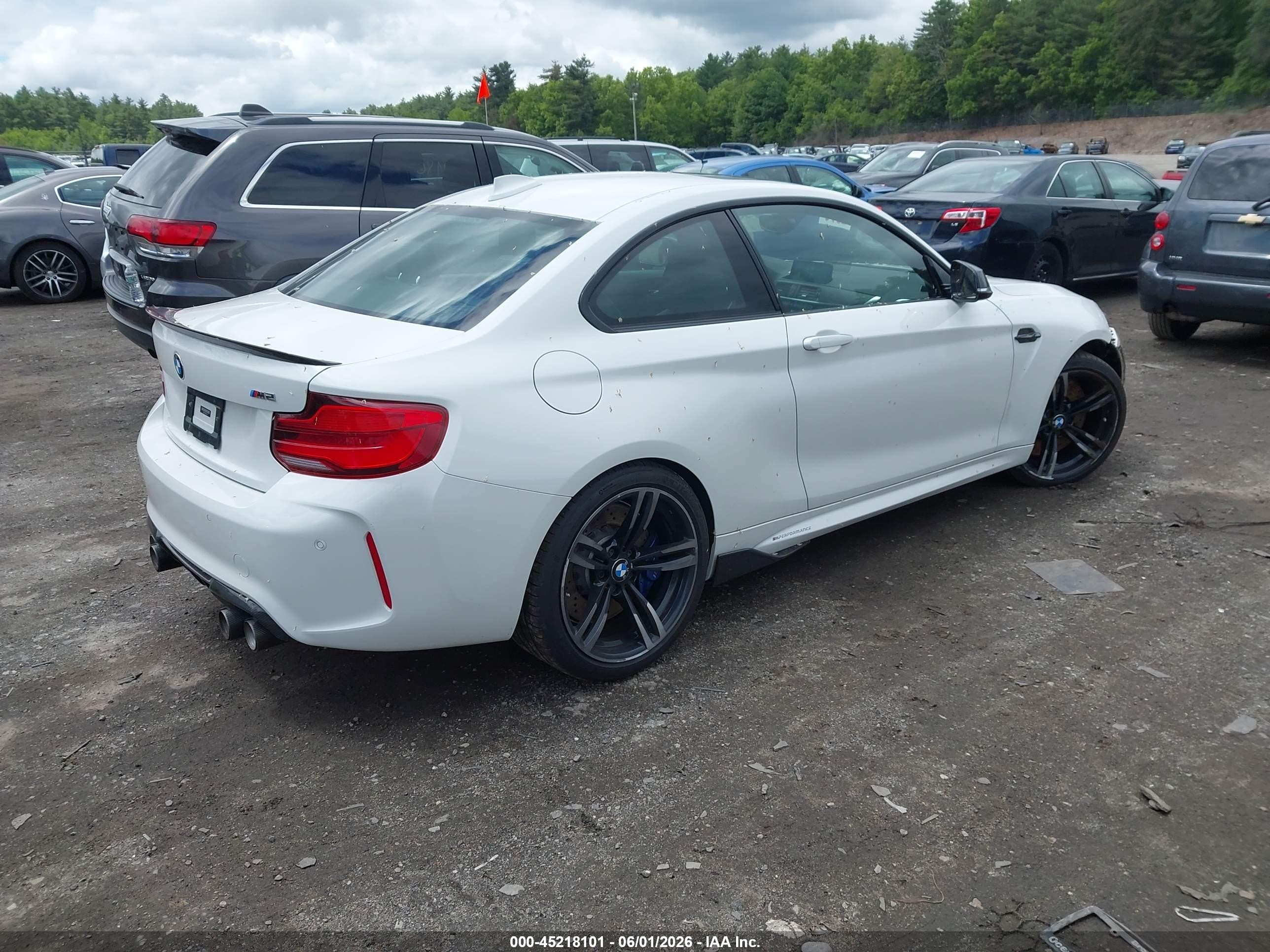 2018 BMW M2 VIN WBS1J5C58JVE51747 IAAI salvage auction — Side, Salvage (Massachusetts), sold $18,200 on 2026-08-27 (photo 4)