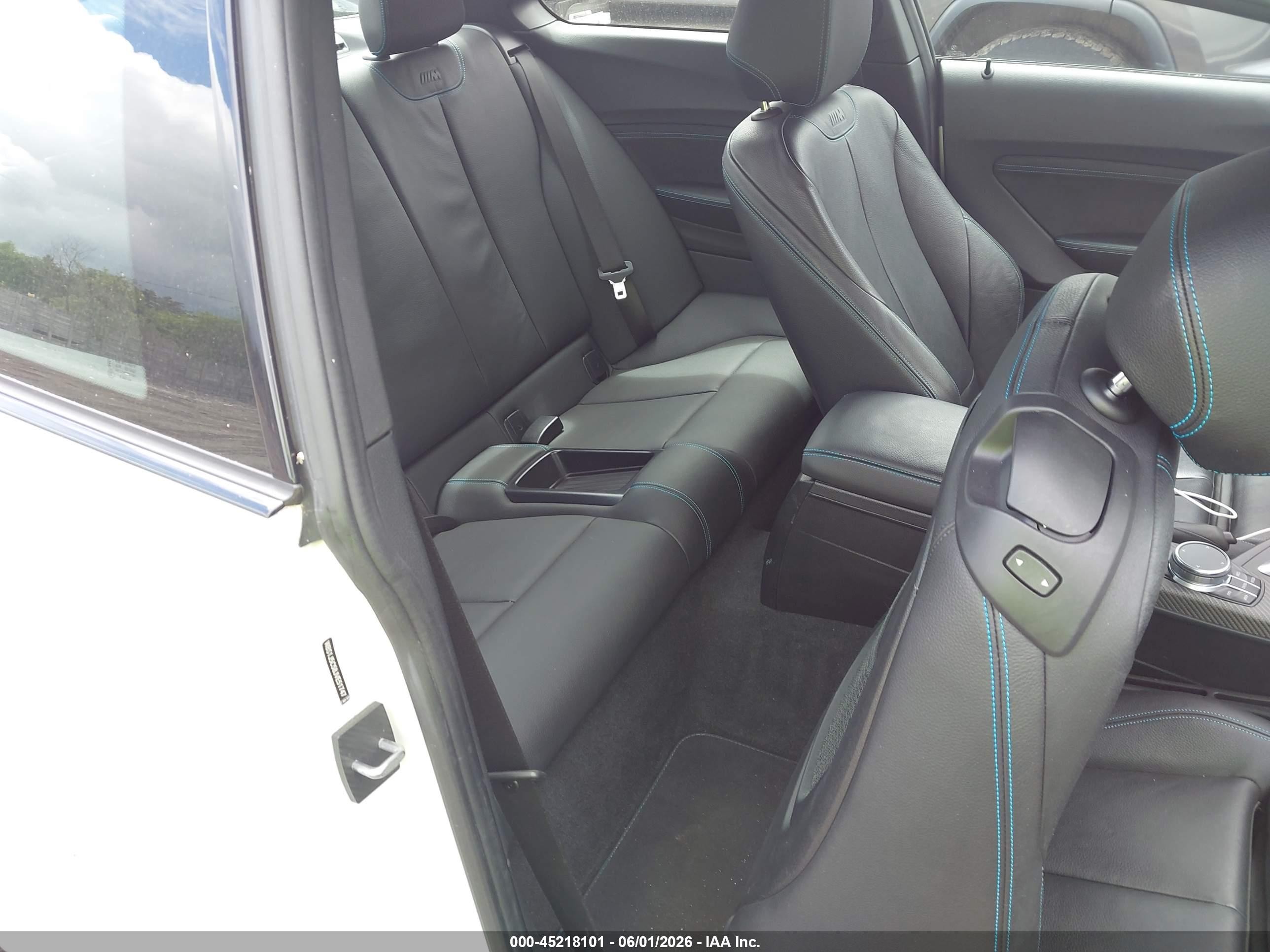2018 BMW M2 VIN WBS1J5C58JVE51747 IAAI salvage auction — Side, Salvage (Massachusetts), sold $18,200 on 2026-08-27 (photo 8)