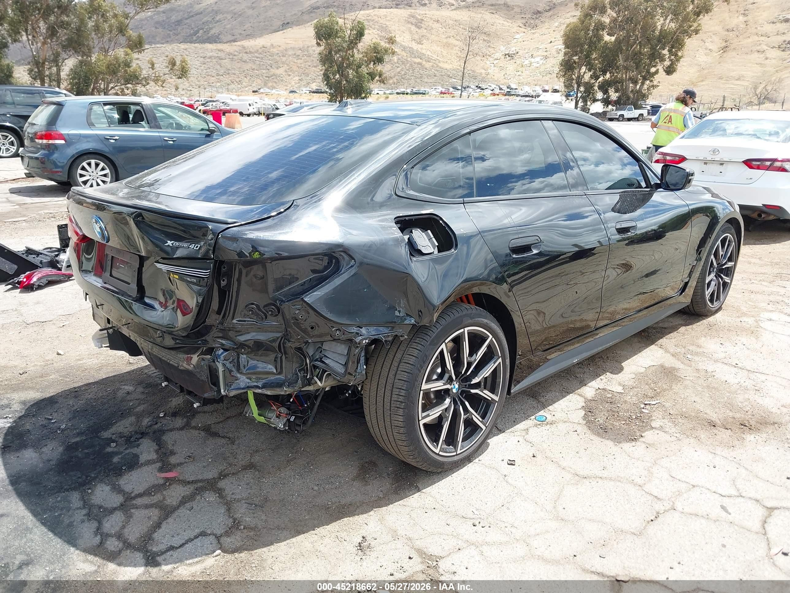 2025 BMW I4 VIN WBY43HD06SFU60439 IAAI salvage auction — Rear End, Salvage (California), sold $19,650 on 2026-08-17 (photo 4)