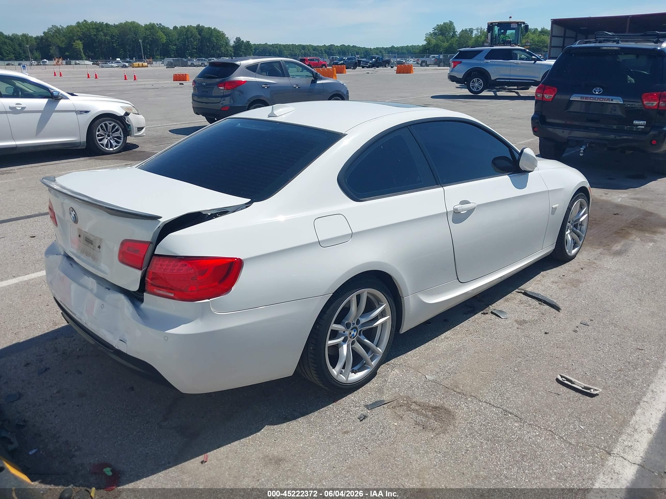 2011 BMW 3er VIN WBAKF5C55BE655544 IAAI salvage auction — Rear End, Salvage (Idaho), sold $1,700 on 2026-10-06 (photo 4)