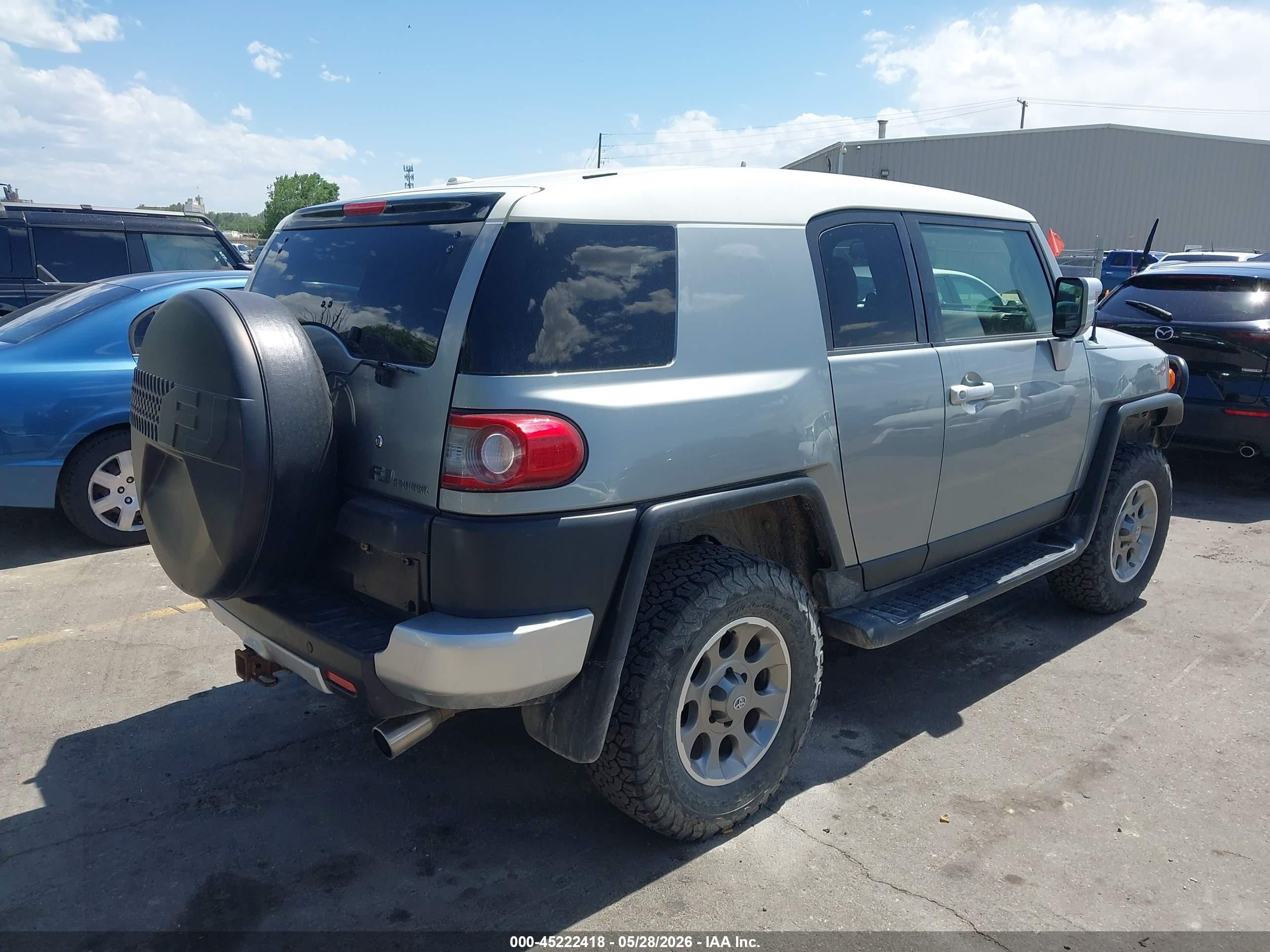 2012 Toyota FJ Cruiser VIN JTEBU4BF1CK138317 IAAI salvage auction — Side, Salvage (Utah), sold $4,500 on 2026-07-09 (photo 4)
