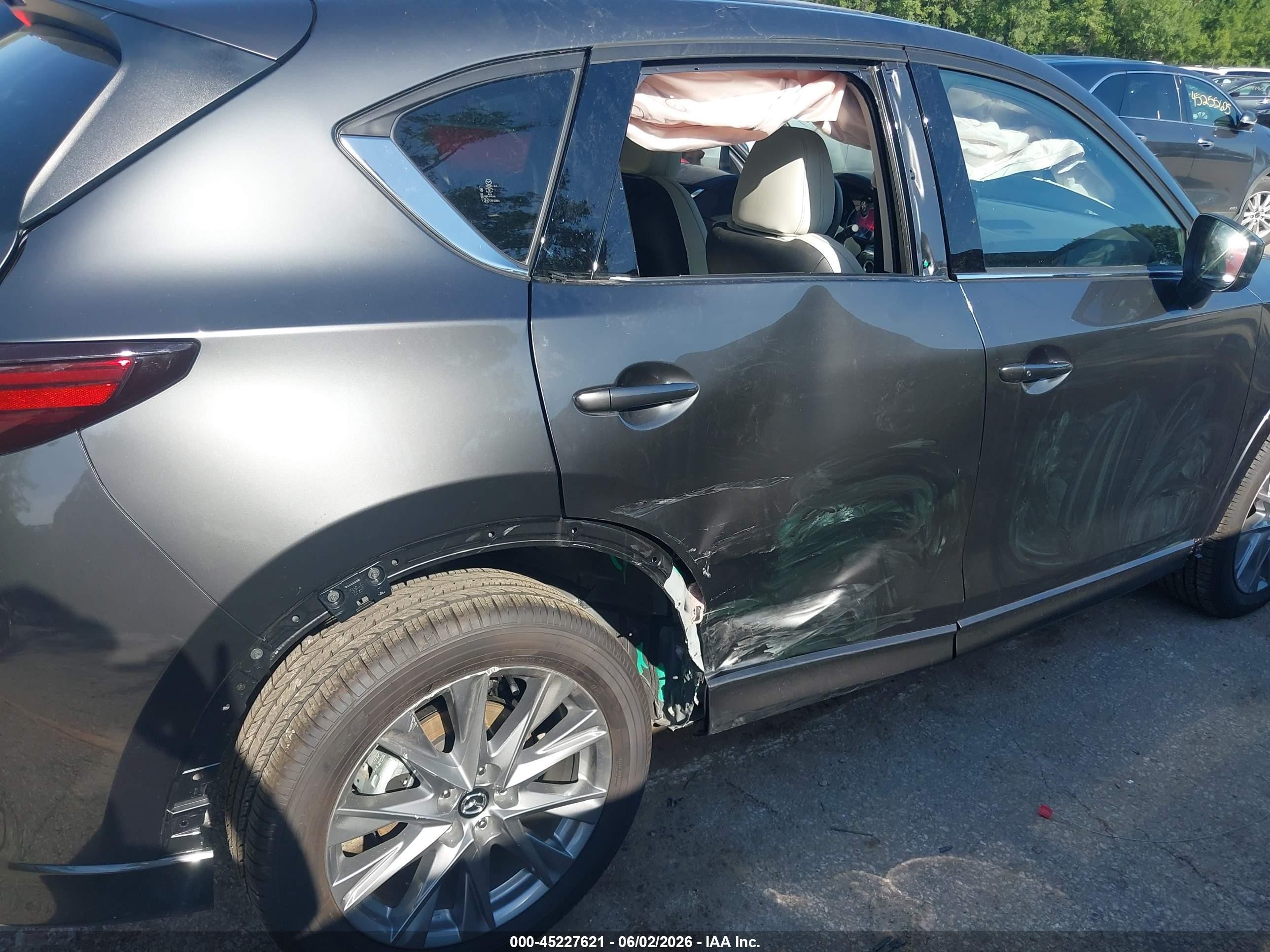 2025 Mazda Cx-5 VIN JM3KFBEM5S0761485 IAAI salvage auction — Side, Salvage (Kansas), sold $11,500 on 2026-10-02 (photo 6)