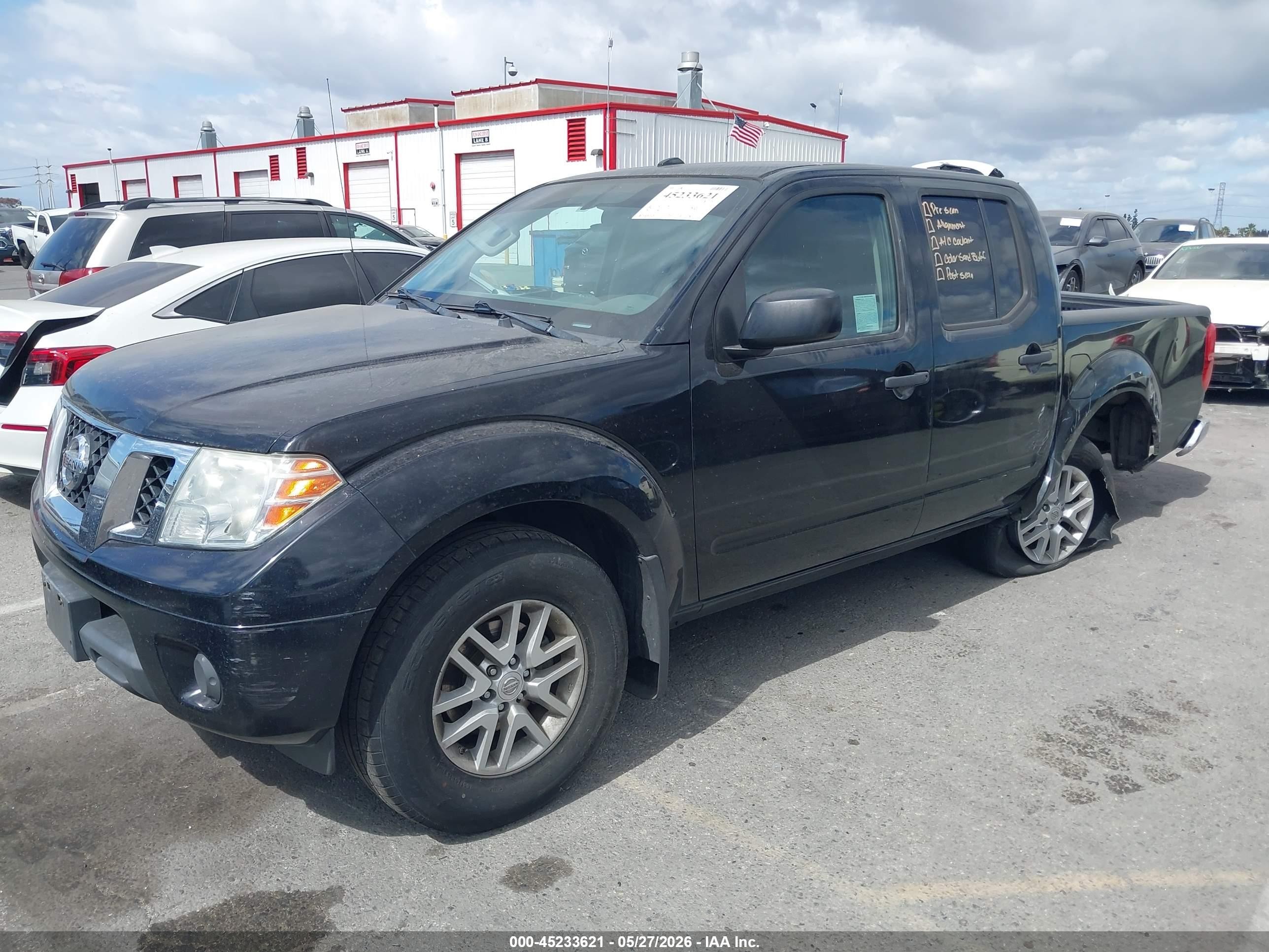 2018 Nissan Frontier VIN 1N6AD0ER2JN719624 IAAI salvage auction — Side, Salvage (California), sold $4,350 on 2026-07-09 (photo 2)