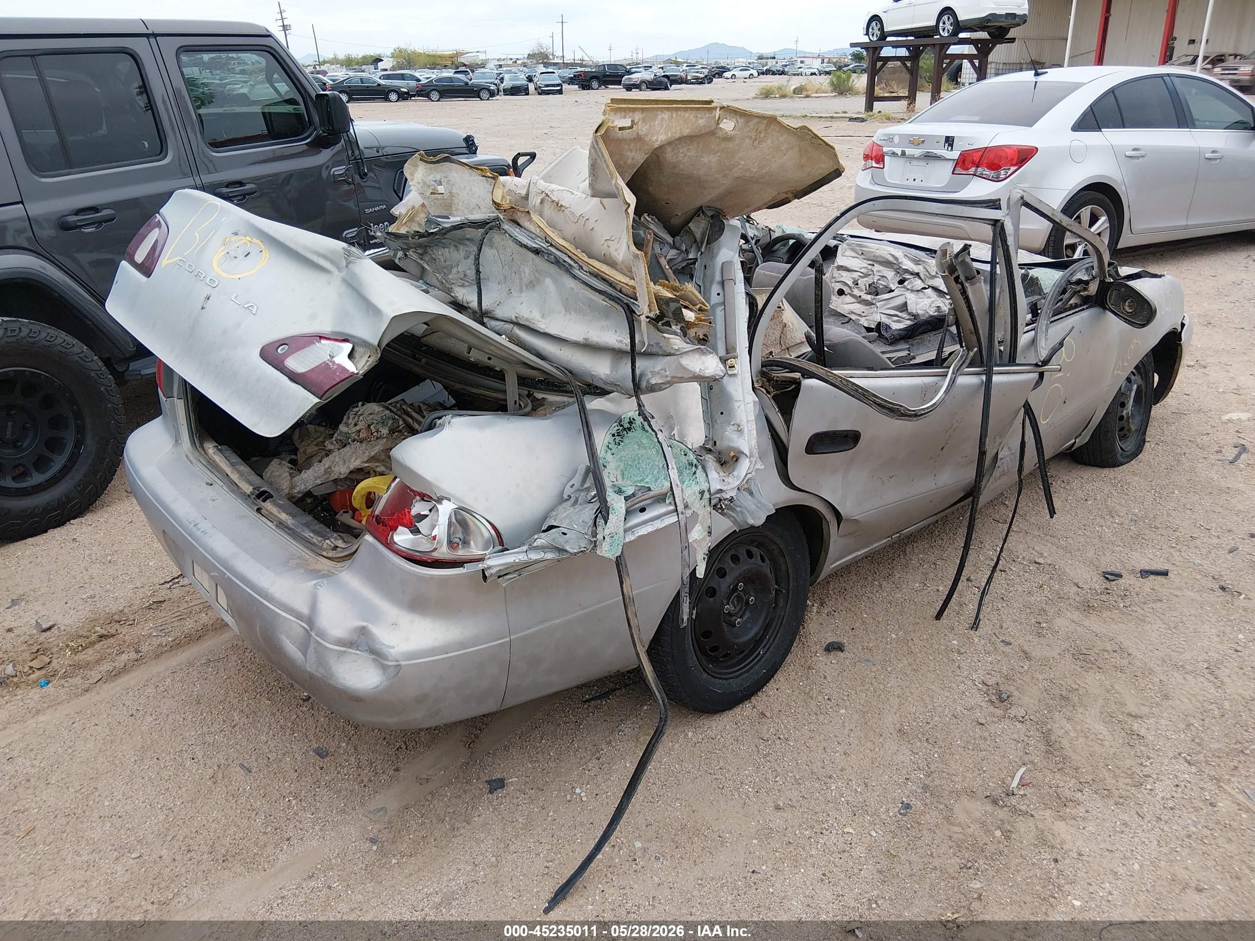 2000 Toyota Corolla VIN 1NXBR12E8YZ410848 IAAI salvage auction — All Over, Non-Repairable (Arizona), sold $75 on 2026-06-11 (photo 4)
