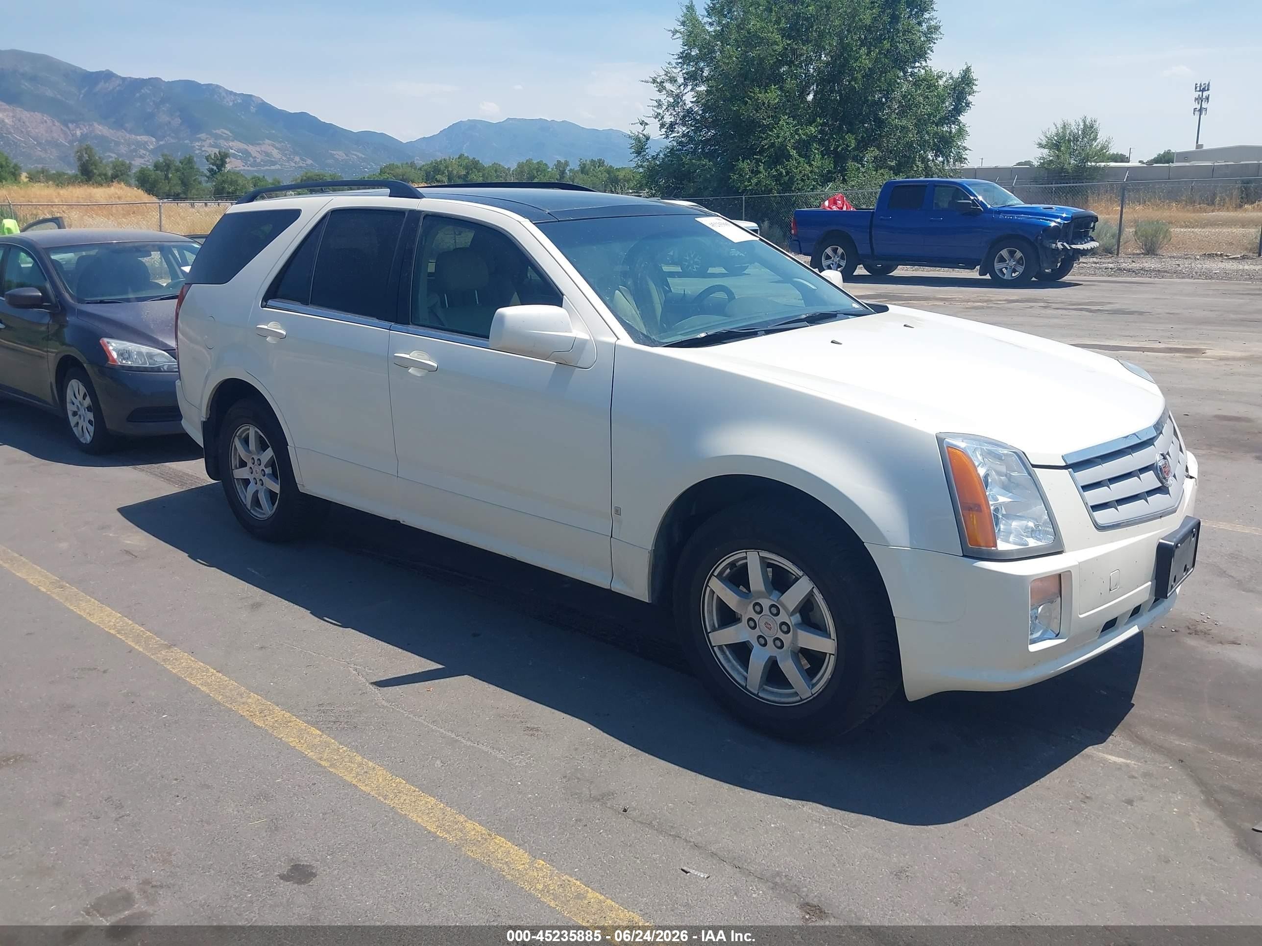 2008 Cadillac SRX VIN 1GYEE437180141110 IAAI salvage auction — Front & Rear, Clear (Utah), sold $575 on 2026-07-09 (photo 1)