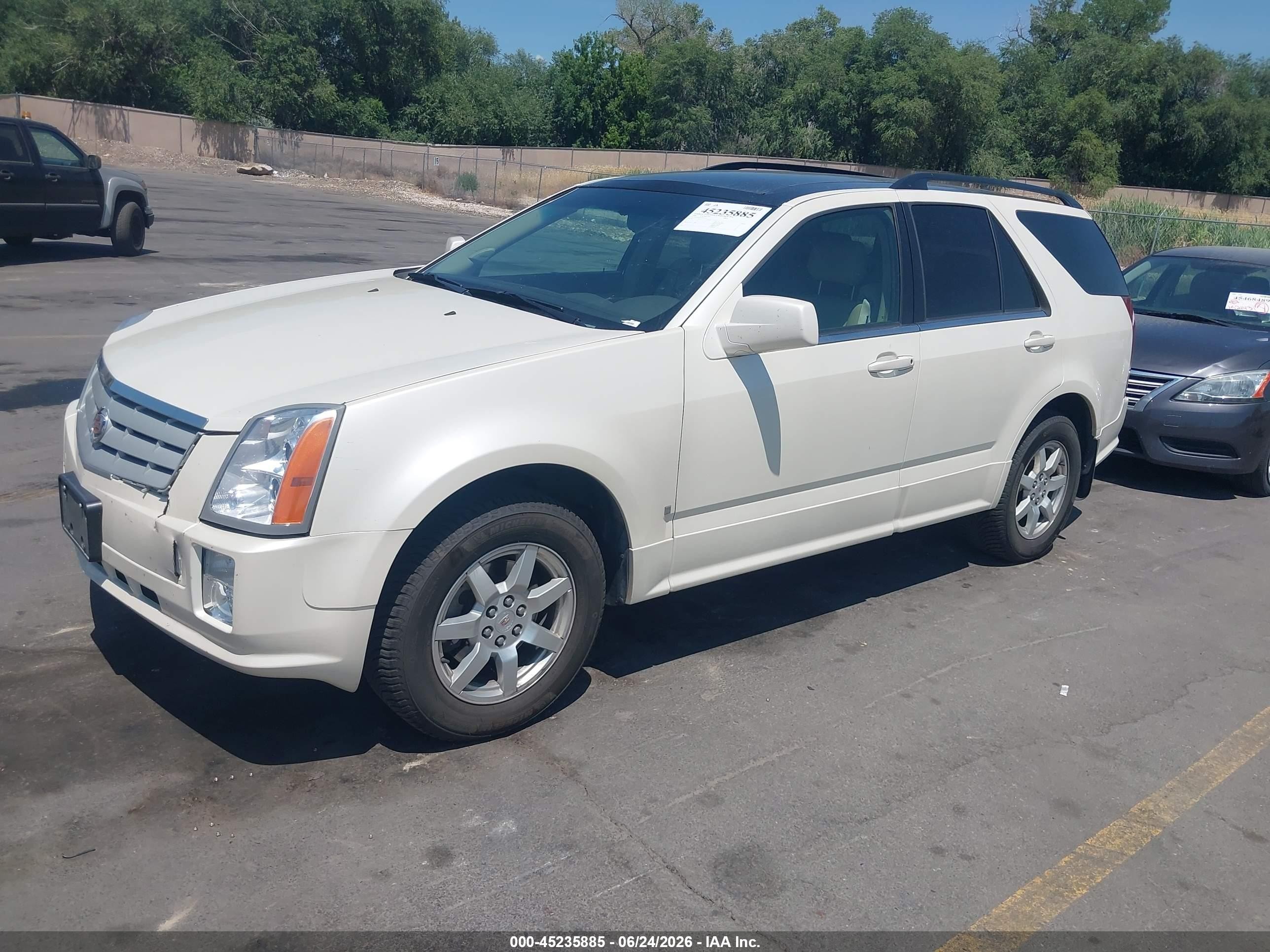 2008 Cadillac SRX VIN 1GYEE437180141110 IAAI salvage auction — Front & Rear, Clear (Utah), sold $575 on 2026-07-09 (photo 2)