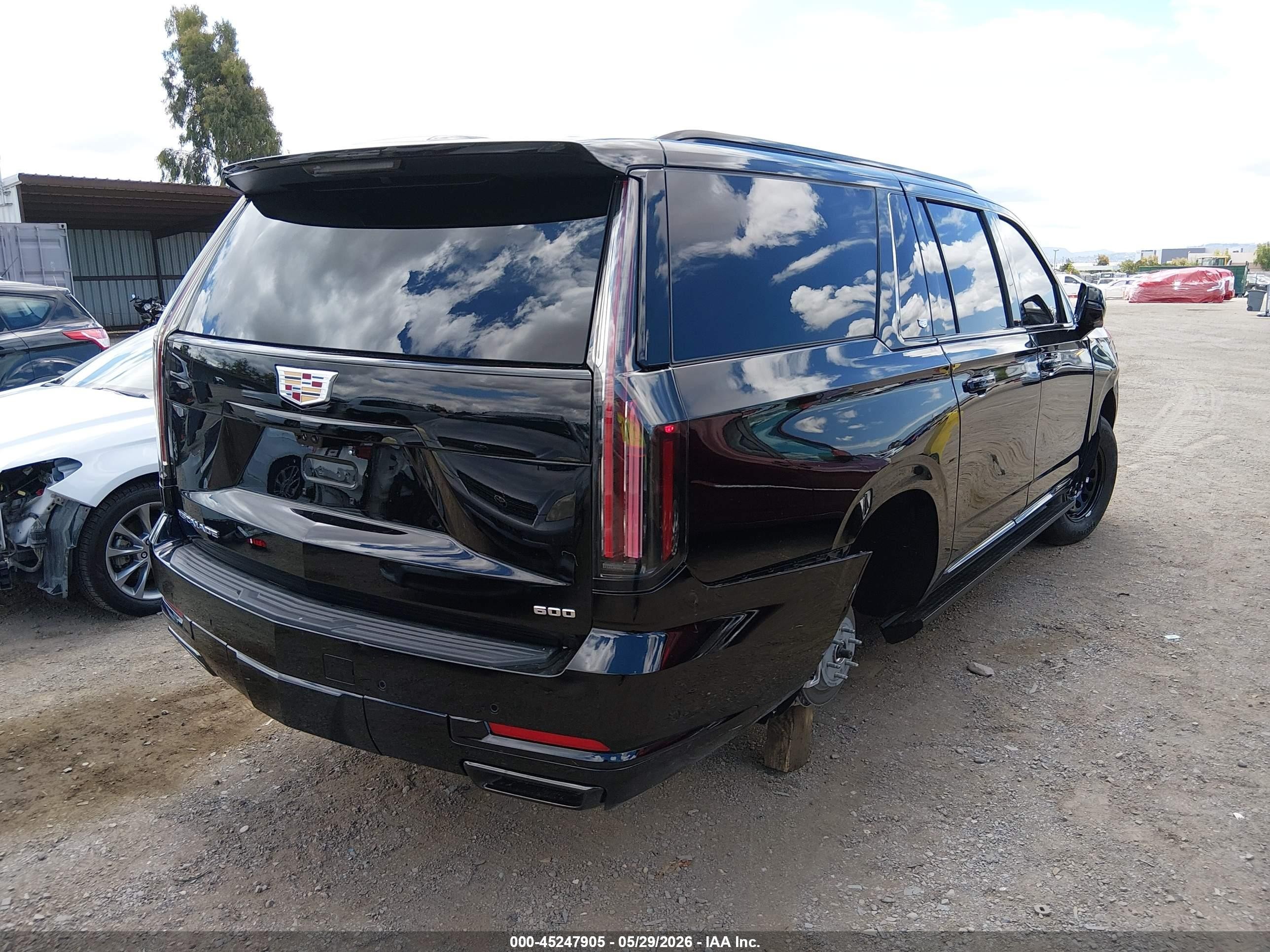 2026 Cadillac Escalade VIN 1GYS8PKL3TR317914 IAAI salvage auction — Side, Salvage (California), sold $57,000 on 2026-08-14 (photo 4)