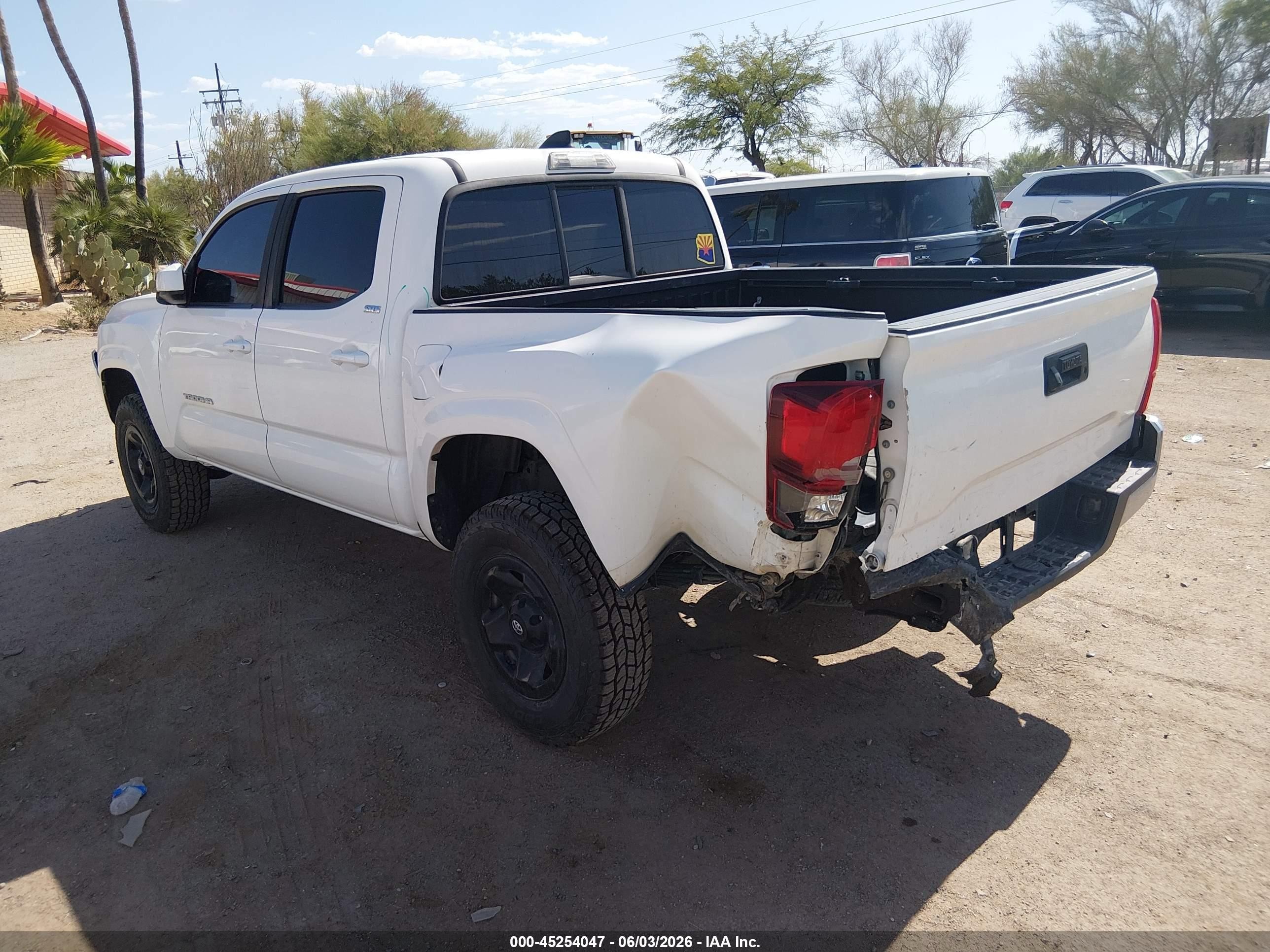 2021 Toyota Tacoma VIN 3TYAX5GN9MT023198 IAAI salvage auction — Front & Rear, Salvage (Arizona), sold $10,000 on 2026-07-09 (photo 3)