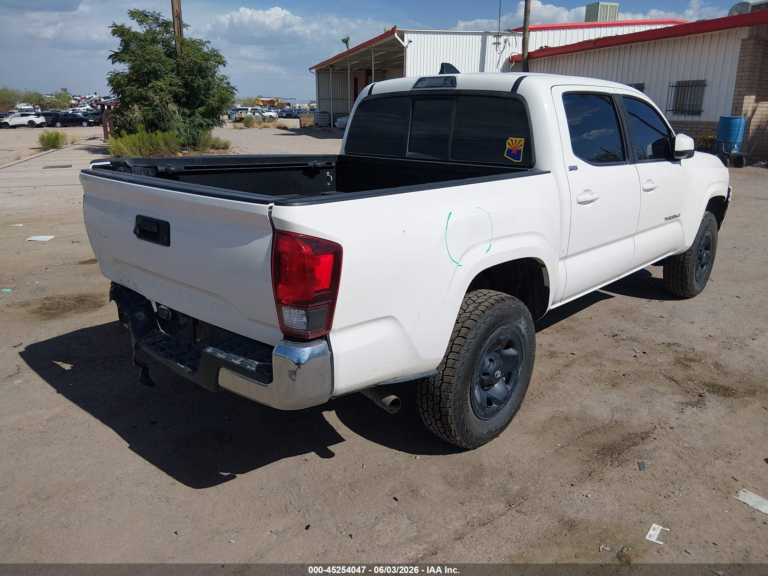 2021 Toyota Tacoma VIN 3TYAX5GN9MT023198 IAAI salvage auction — Front & Rear, Salvage (Arizona), sold $10,000 on 2026-07-09 (photo 4)
