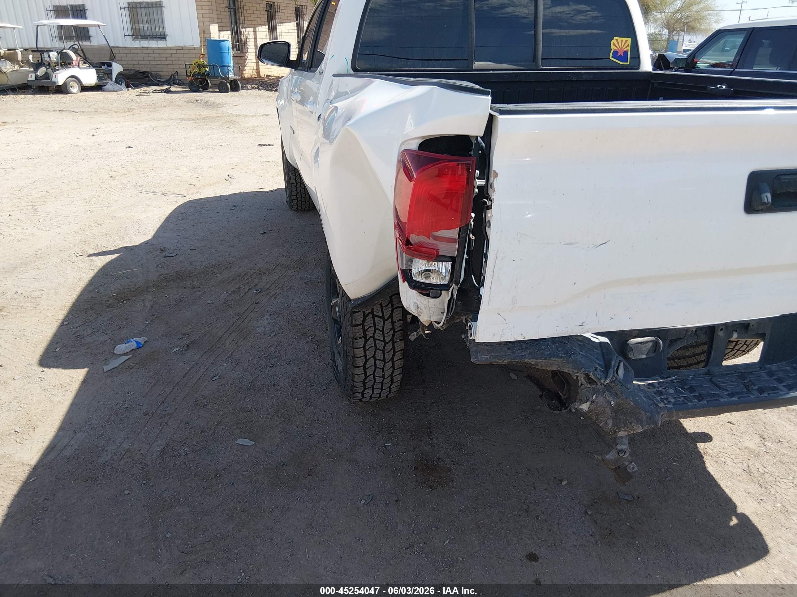 2021 Toyota Tacoma VIN 3TYAX5GN9MT023198 IAAI salvage auction — Front & Rear, Salvage (Arizona), sold $10,000 on 2026-07-09 (photo 6)