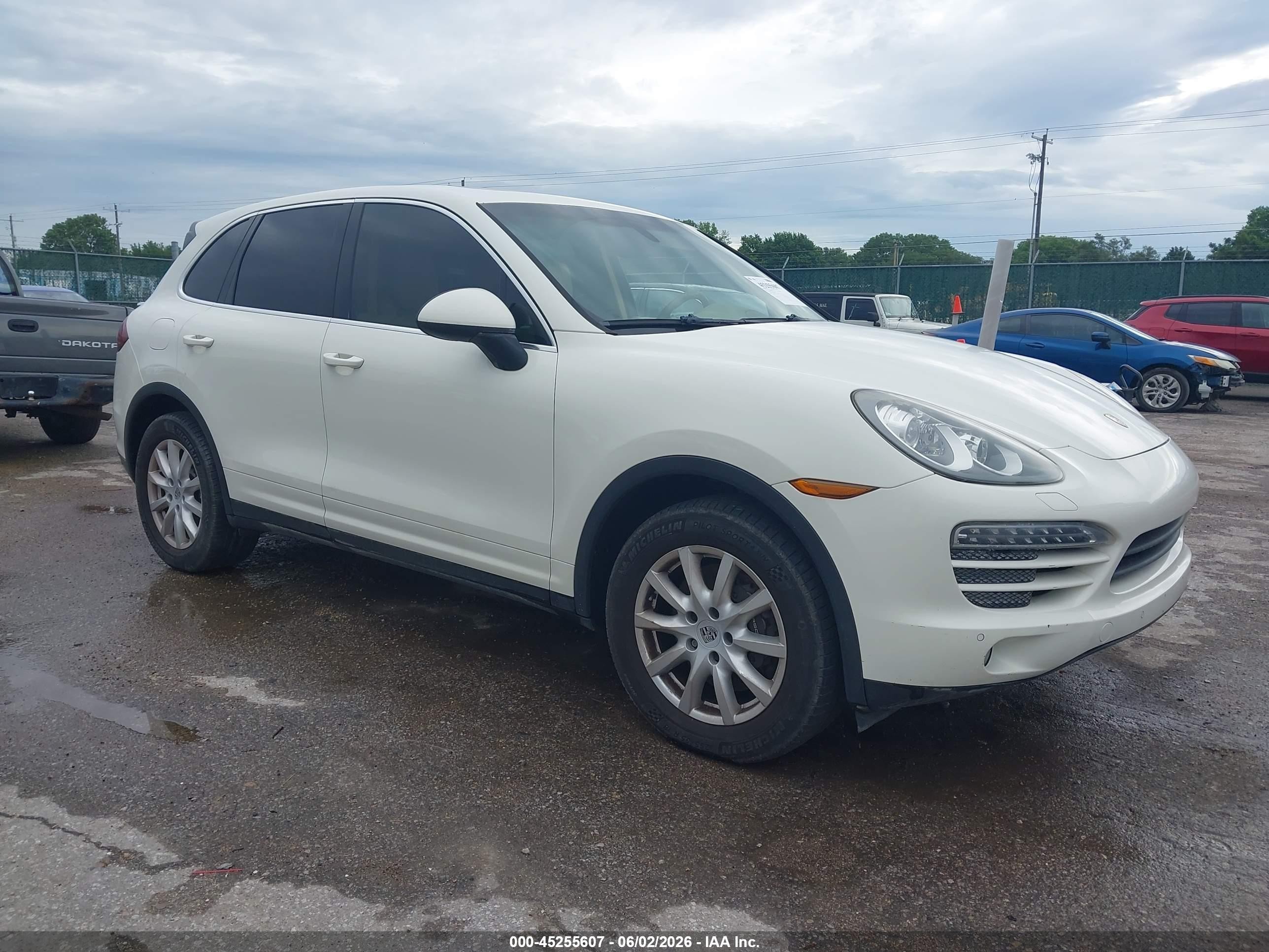 2012 Porsche Cayenne VIN WP1AA2A24CLA04325 IAAI salvage auction — Normal Wear, Clear (Kansas), sold $2,000 on 2026-07-01 (photo 1)