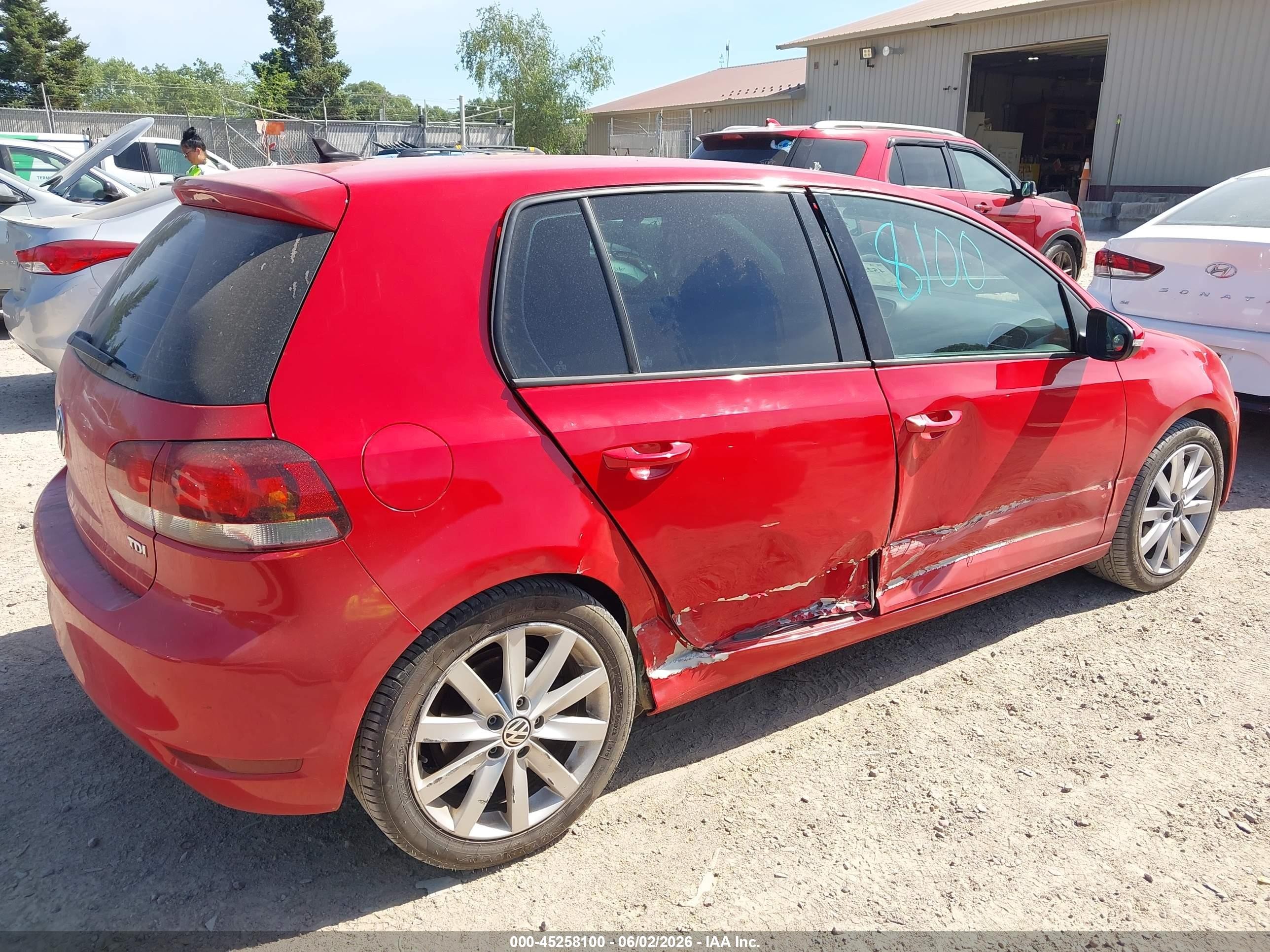 2011 Volkswagen Golf VIN WVWDM7AJ9BW263125 IAAI salvage auction — Side, Junk Bill Of Sale Mv2459 (Wisconsin), sold $1,800 on 2021-02-17 (photo 4)