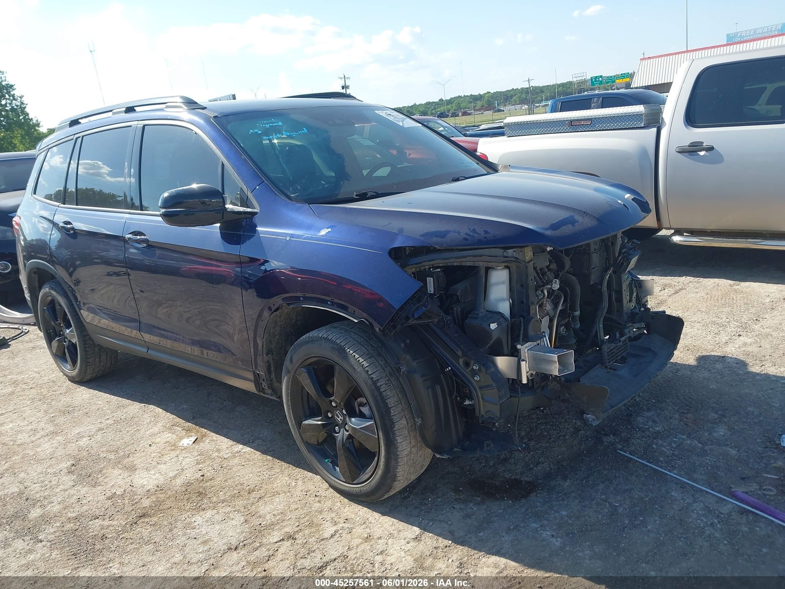 2020 Honda Passport VIN 5FNYF8H07LB001558 — IAAI salvage auction photo