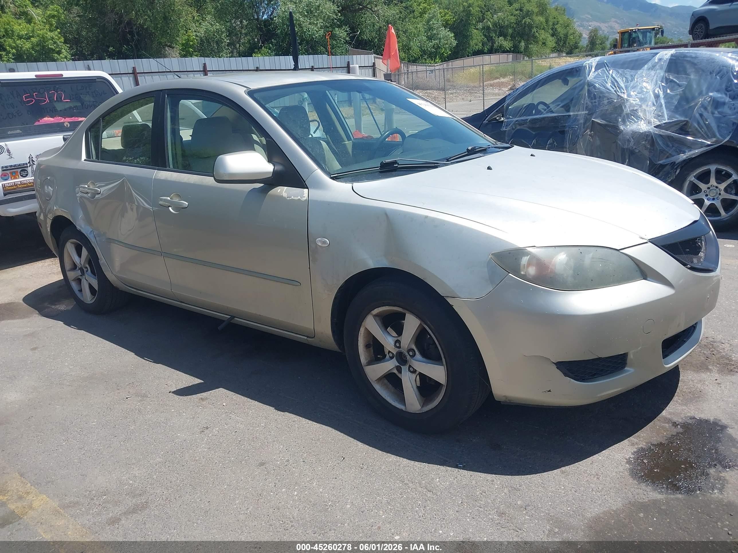 2006 Mazda 3 VIN JM1BK12G361542571 IAAI salvage auction — Side, Salvage (Utah), sold $250 on 2026-07-09 (photo 1)