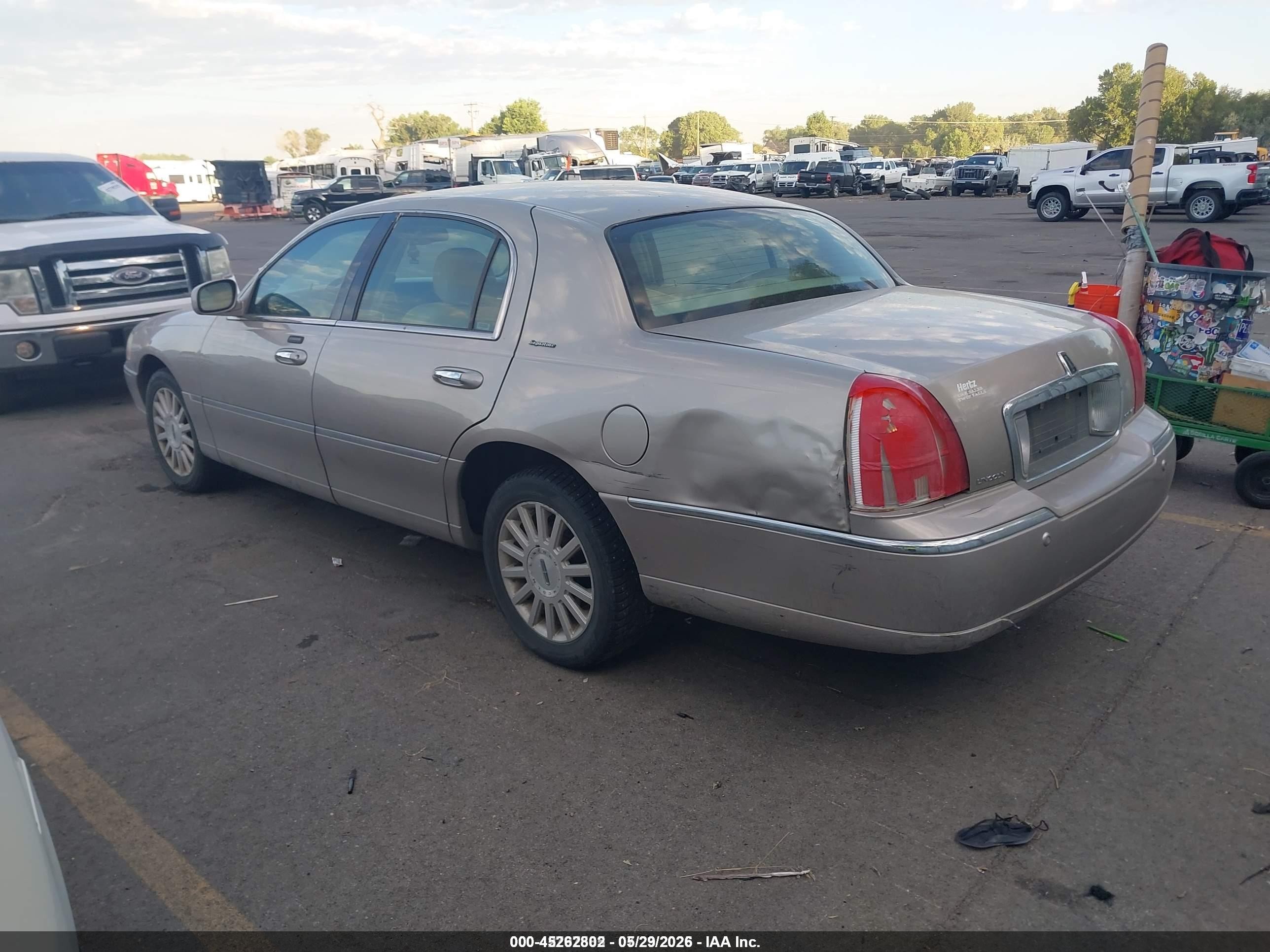 2003 Lincoln Town Car VIN 1LNHM82W93Y696835 IAAI salvage auction — Front & Rear, Salvage (Idaho), sold $275 on 2026-07-09 (photo 3)