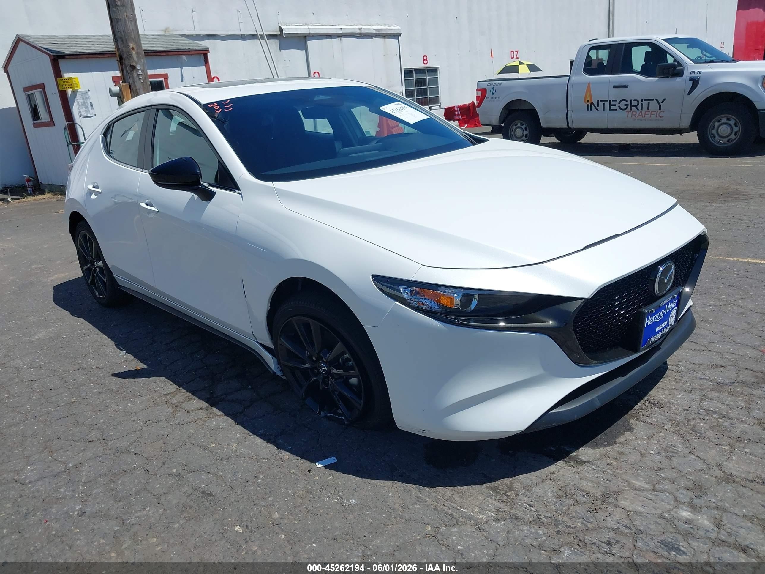 2026 Mazda 3 VIN JM1BPBLL8T1877713 — IAAI salvage auction photo