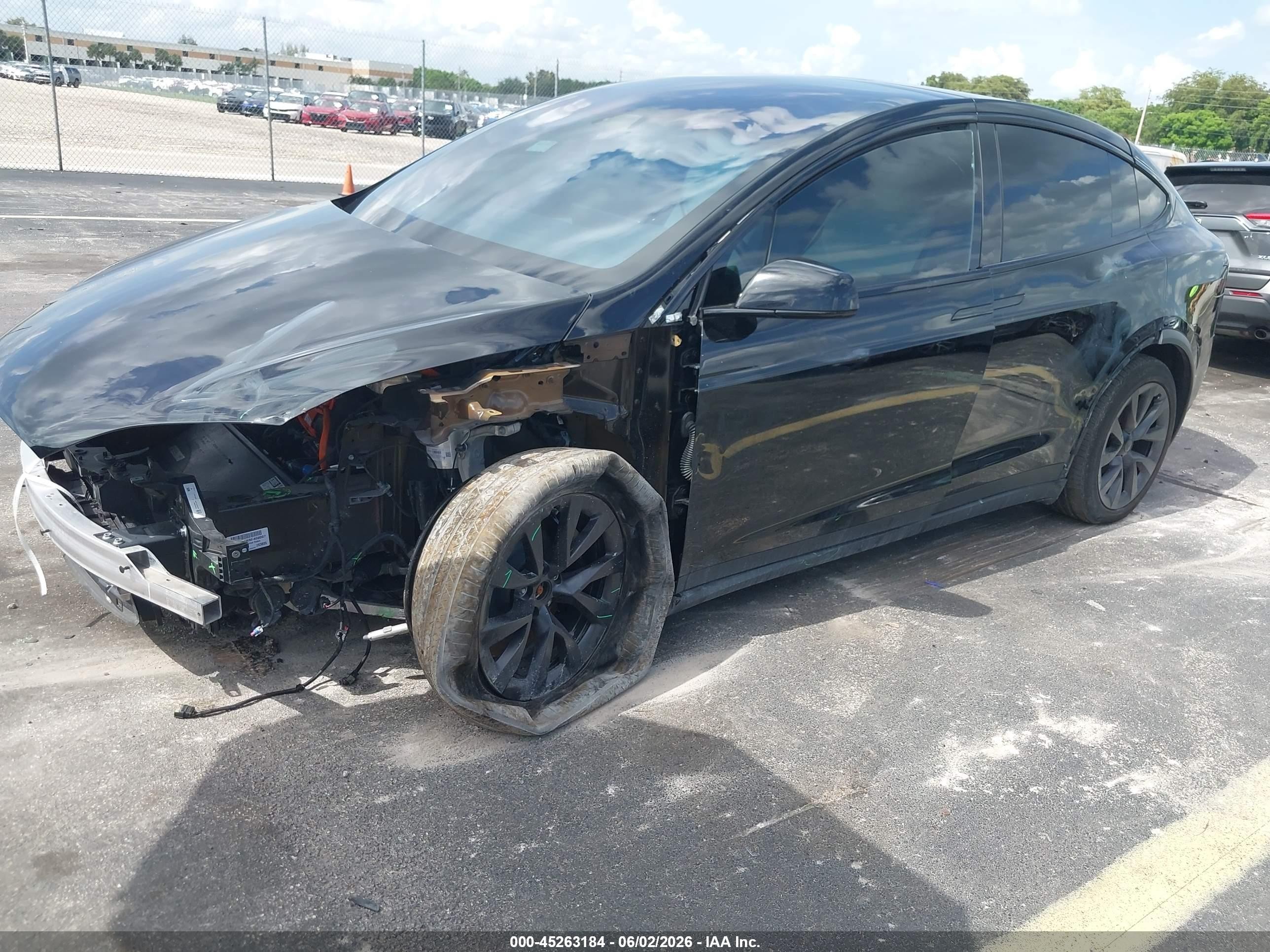 2024 Tesla Model x VIN 7SAXCDE56RF460007 IAAI salvage auction — Unknown, Rebuildable (Florida), sold $19,000 on 2026-08-13 (photo 2)