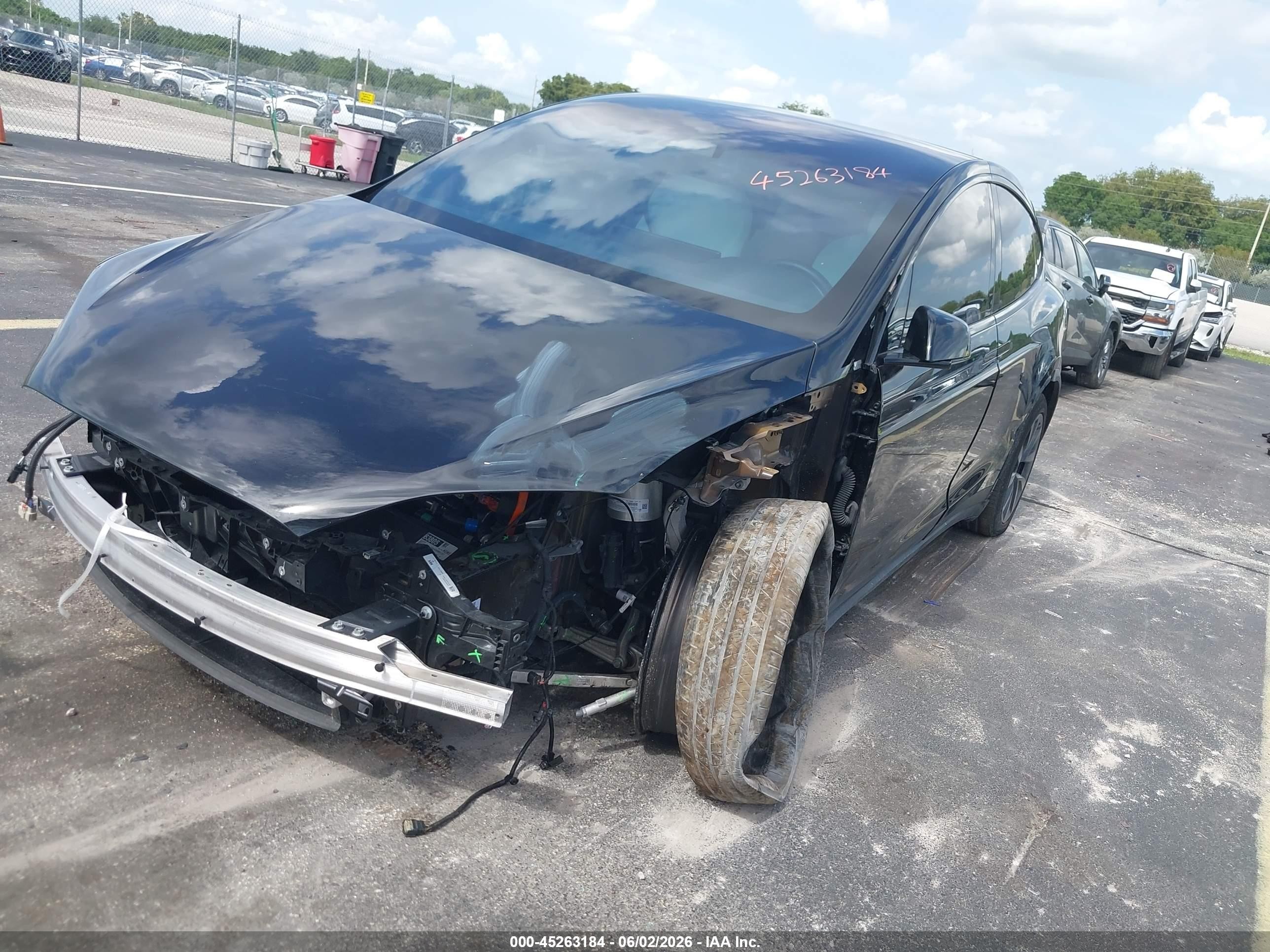 2024 Tesla Model x VIN 7SAXCDE56RF460007 IAAI salvage auction — Unknown, Rebuildable (Florida), sold $19,000 on 2026-08-13 (photo 6)