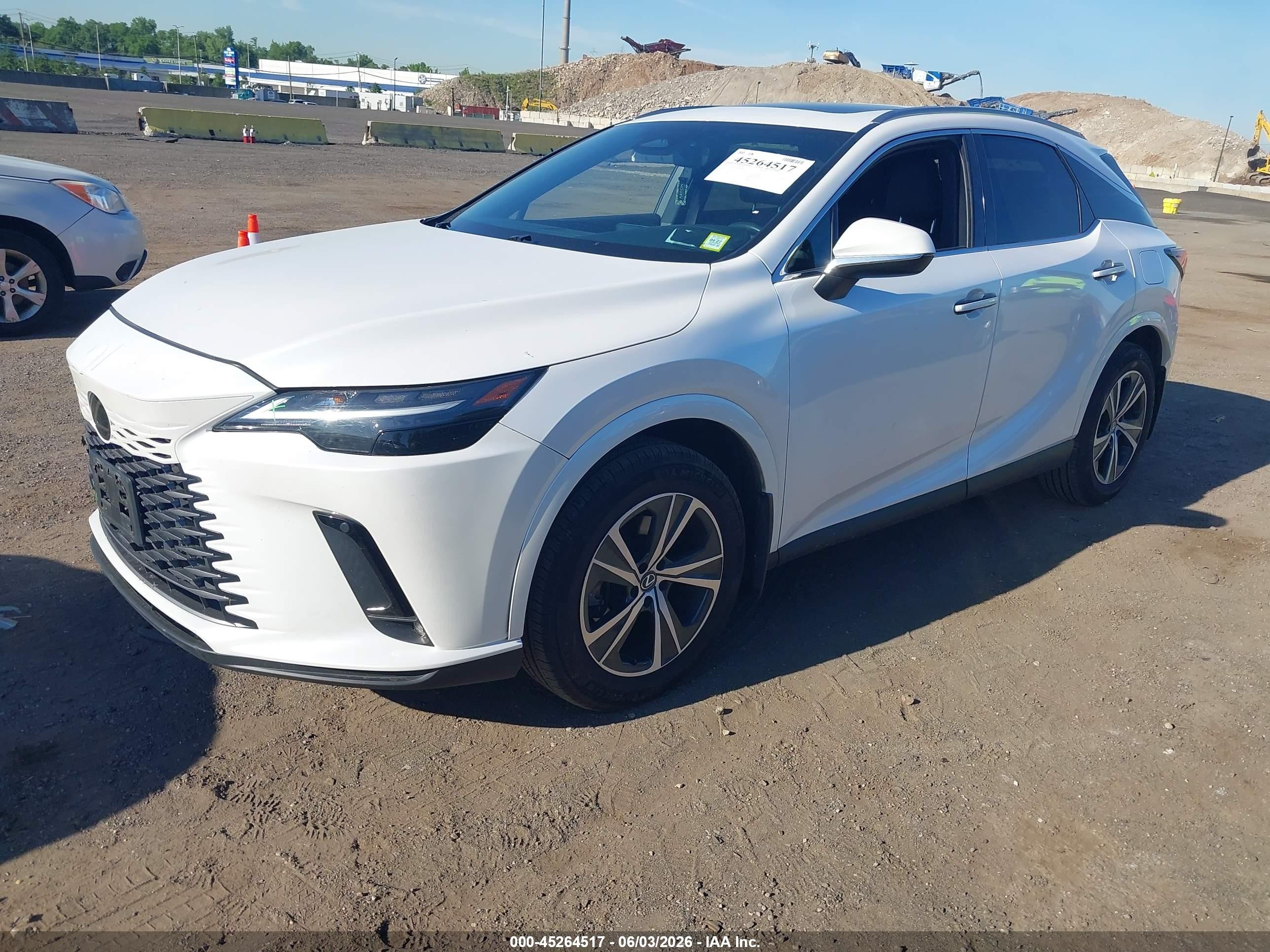2024 Lexus RX 350 VIN 2T2BAMCA5RC069282 IAAI salvage auction — Side, Mv-907A (New York), sold $26,400 on 2026-08-25 (photo 2)