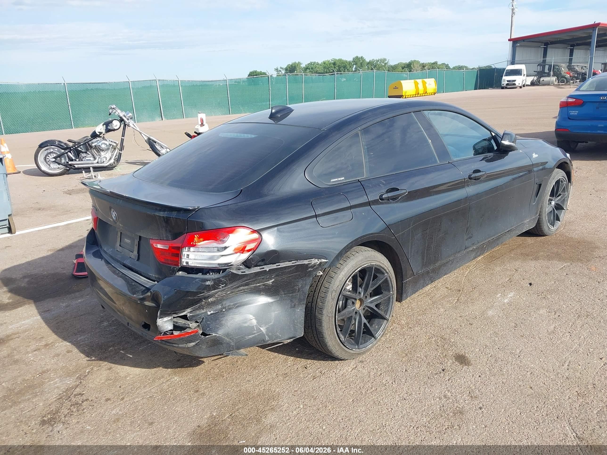 2015 BMW 4er VIN WBA4C9C56FD331796 IAAI salvage auction — Rear End, Regular (South Dakota), sold $1,825 on 2026-09-08 (photo 4)