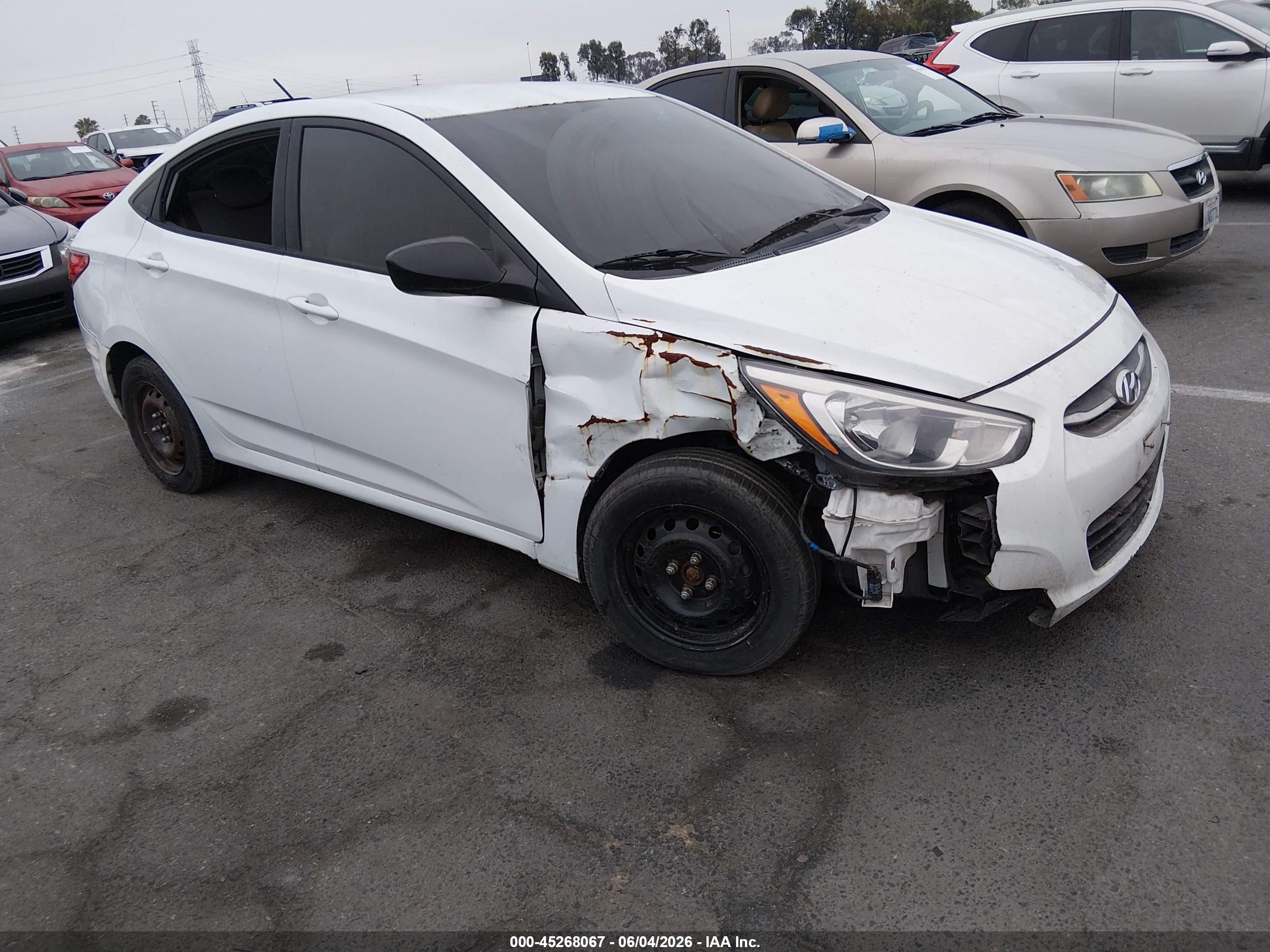 2015 Hyundai Accent VIN KMHCT4AE5FU806273 IAAI salvage auction — Normal Wear, Salvage (California), sold $425 on 2026-07-09 (photo 1)
