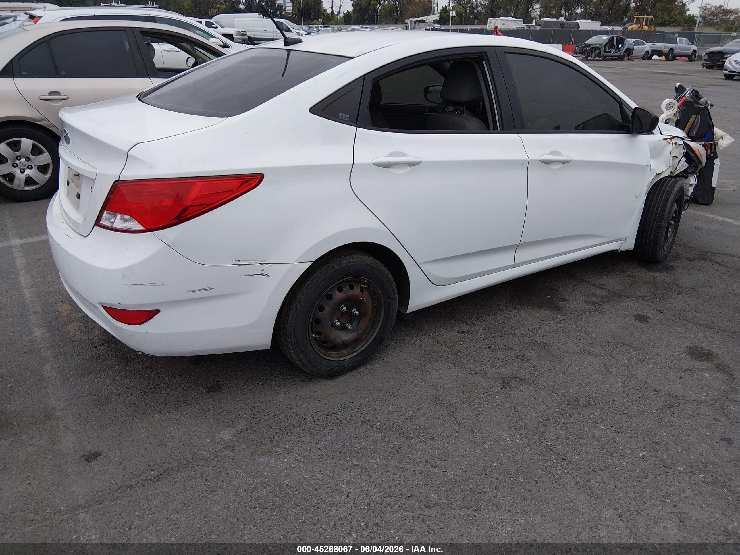 2015 Hyundai Accent VIN KMHCT4AE5FU806273 IAAI salvage auction — Normal Wear, Salvage (California), sold $425 on 2026-07-09 (photo 4)