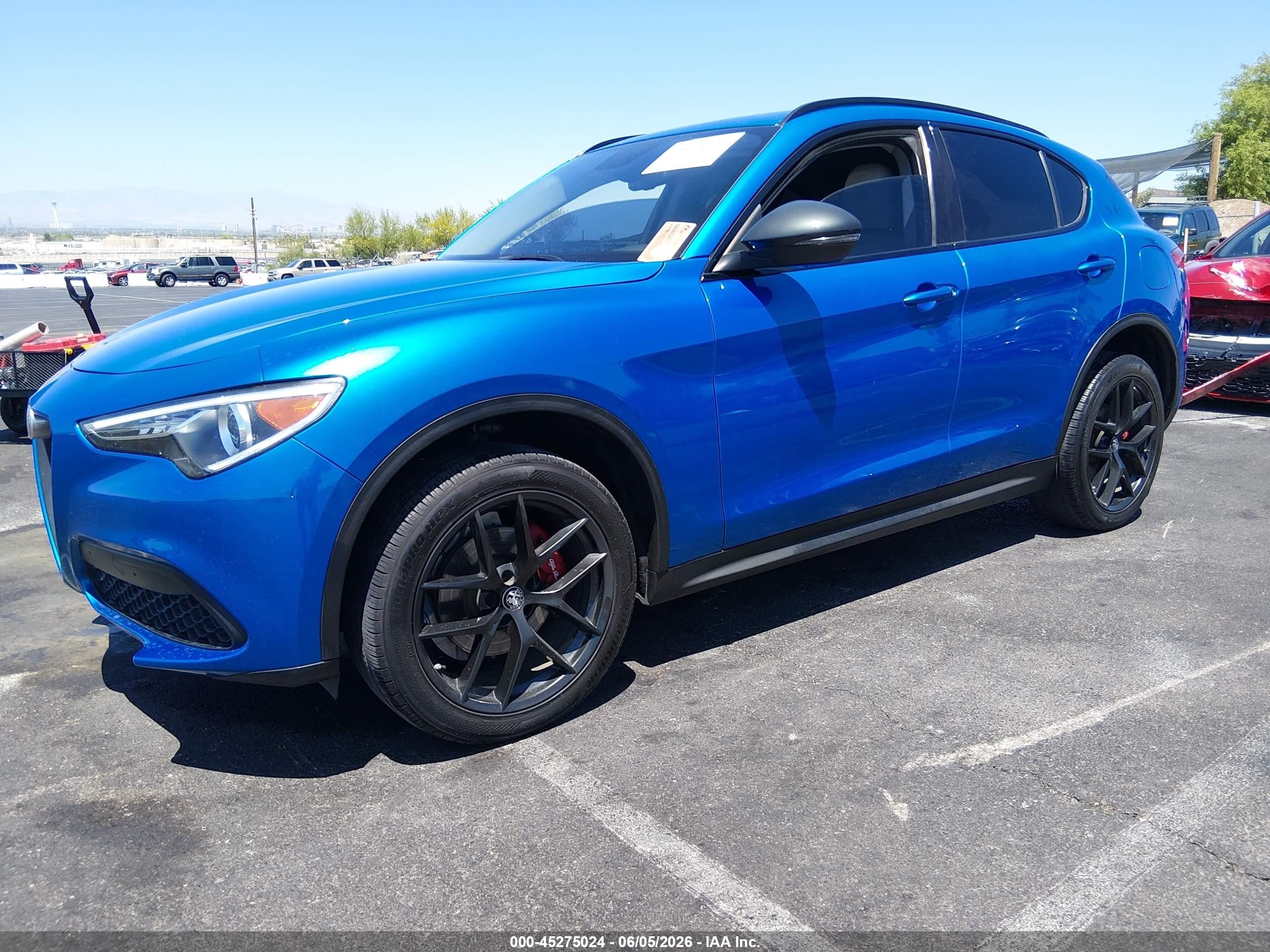 2019 Alfa romeo Stelvio VIN ZASPAJAN5K7C48774 IAAI salvage auction — Side, Salvage (Nevada), sold $5,100 on 2026-09-04 (photo 2)