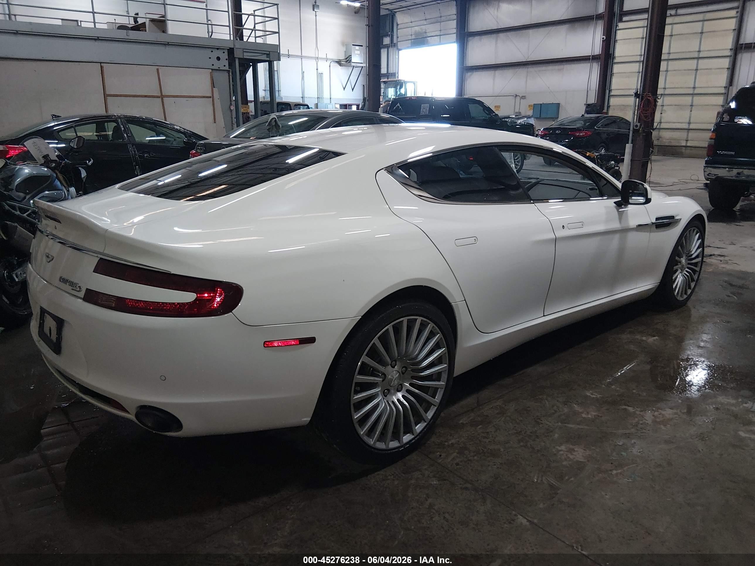 2016 Aston martin Rapide VIN SCFHMDBS5GGF05390 IAAI salvage auction — Unknown, Salvage (Idaho), sold $19,100 on 2026-09-04 (photo 4)
