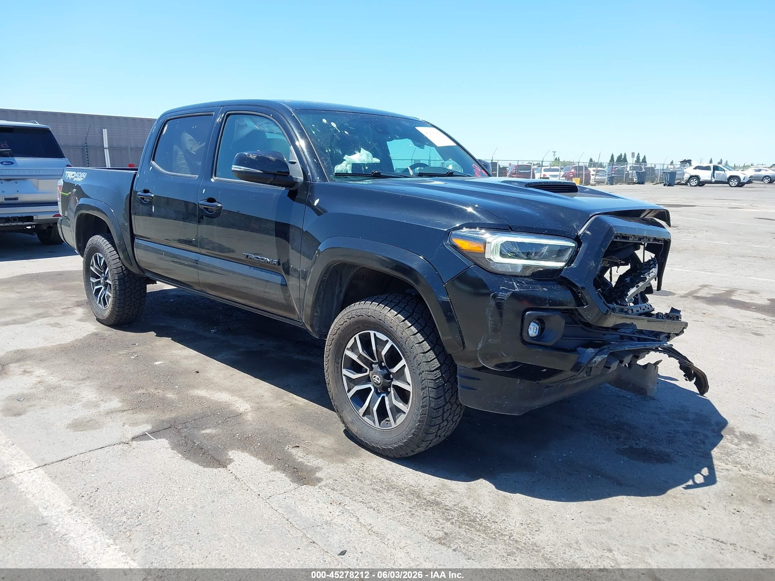 2023 Toyota Tacoma VIN 3TMCZ5AN3PM640169 — IAAI salvage auction photo