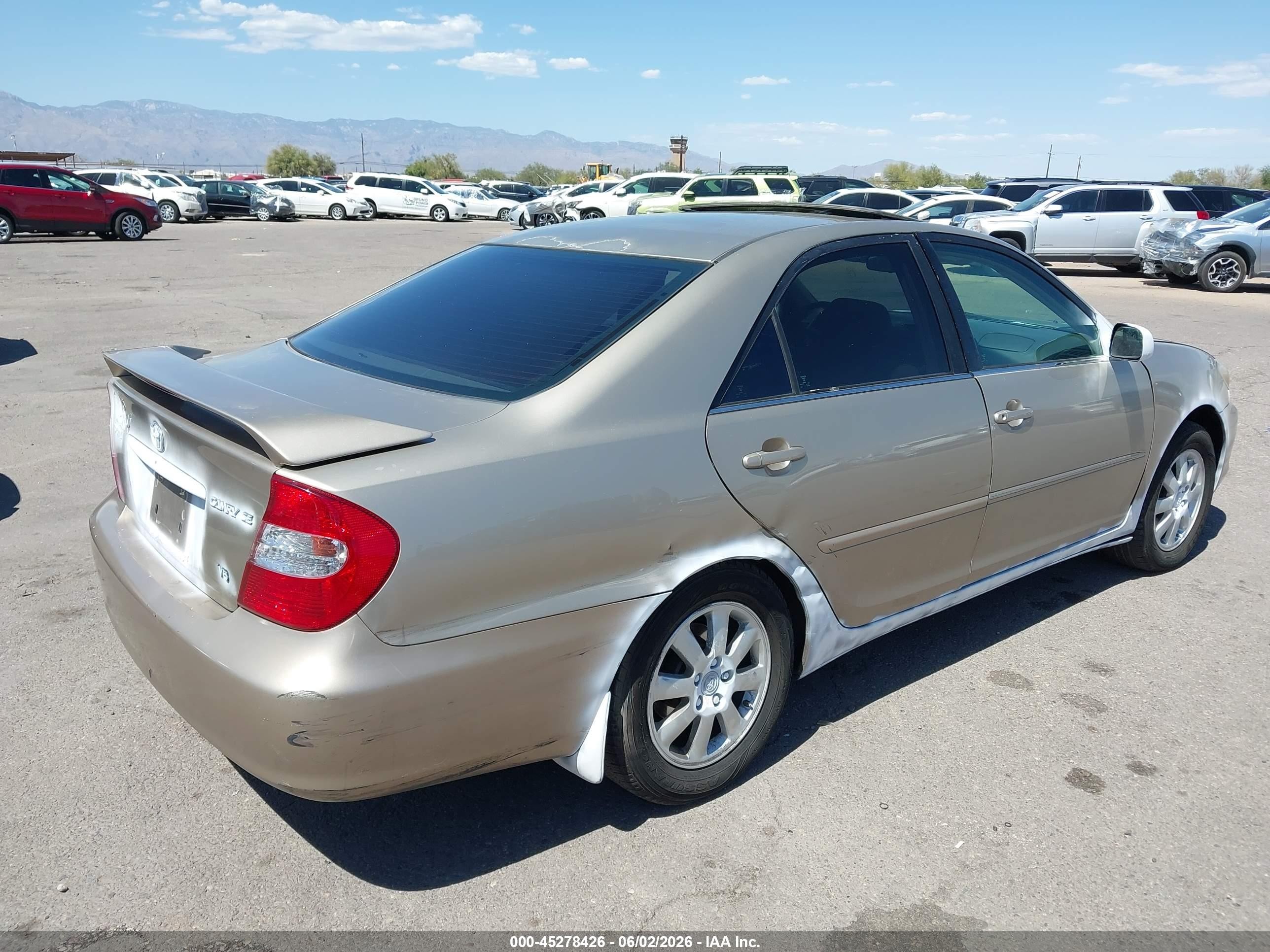 2002 Toyota Camry VIN 4T1BF30K32U504561 IAAI salvage auction — Theft, Salvage (Arizona), sold $1,050 on 2026-07-09 (photo 4)