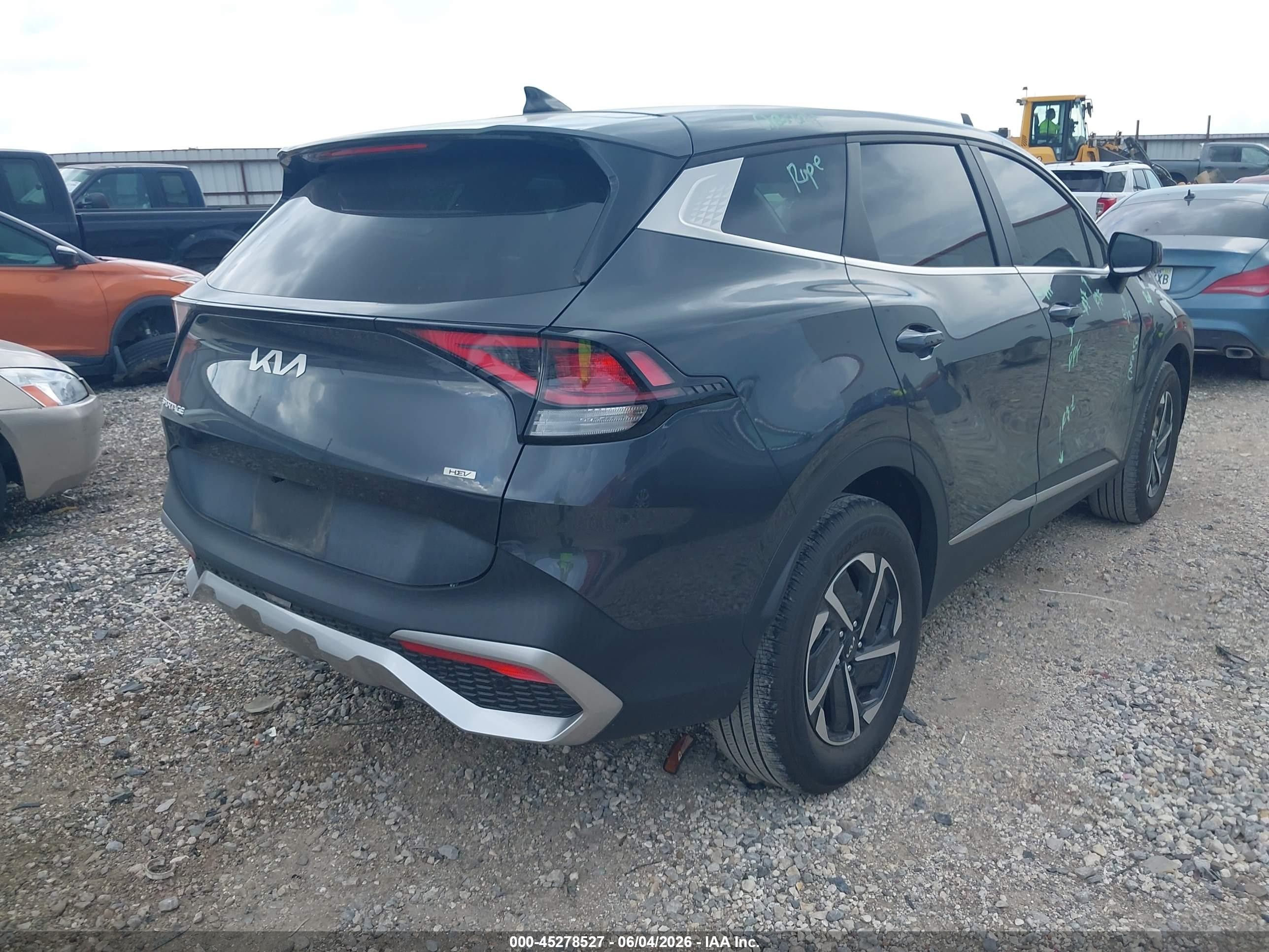 2023 Kia Sportage VIN KNDPUCAG4P7111491 IAAI salvage auction — Unknown, Salvage (Arkansas), sold $8,100 on 2026-09-12 (photo 4)