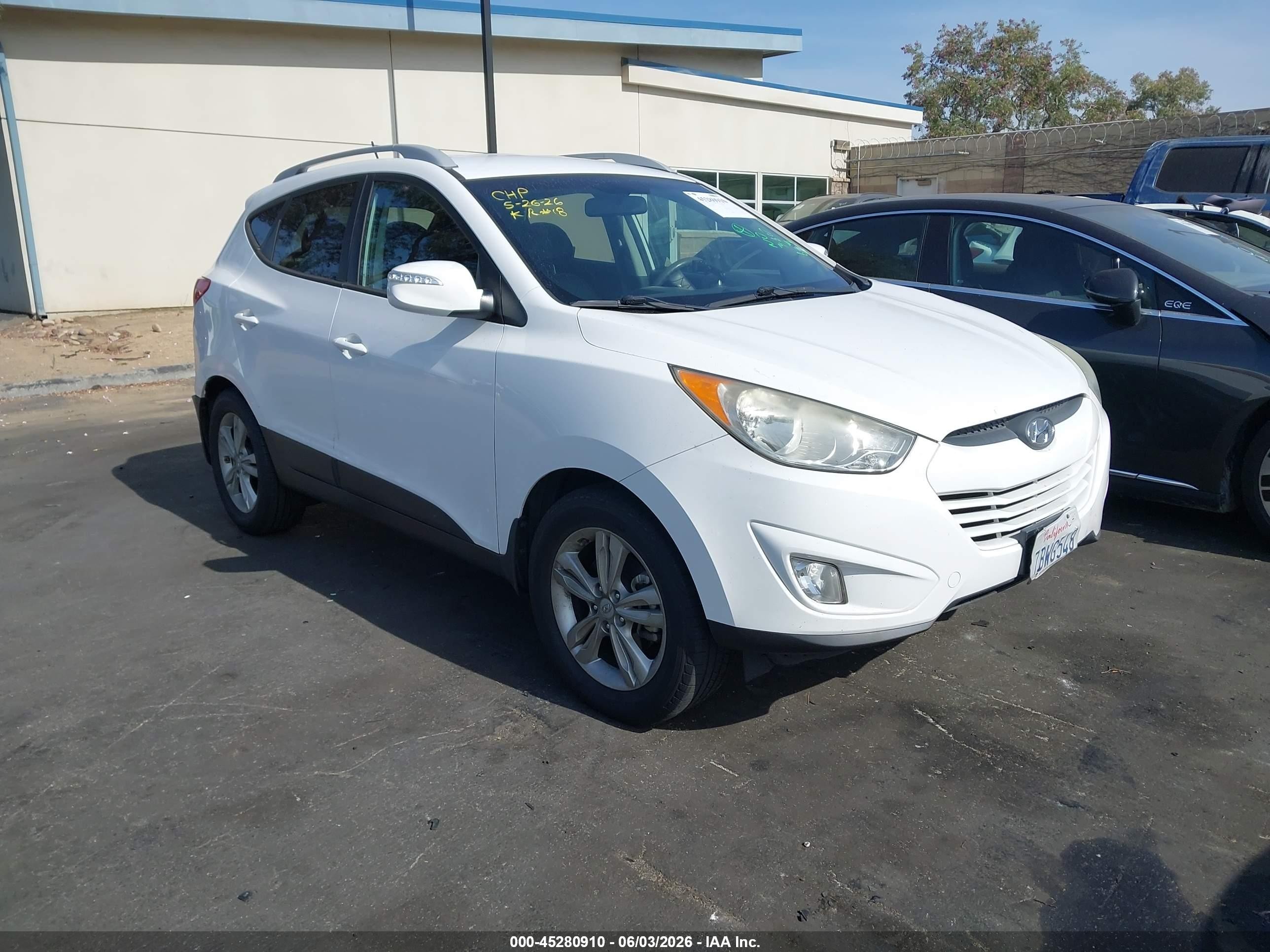 2013 Hyundai Tucson VIN KM8JU3AC1DU753971 IAAI salvage auction — Front & Rear, Salvage Certificate (California), sold $1,750 on 2026-07-10 (photo 1)