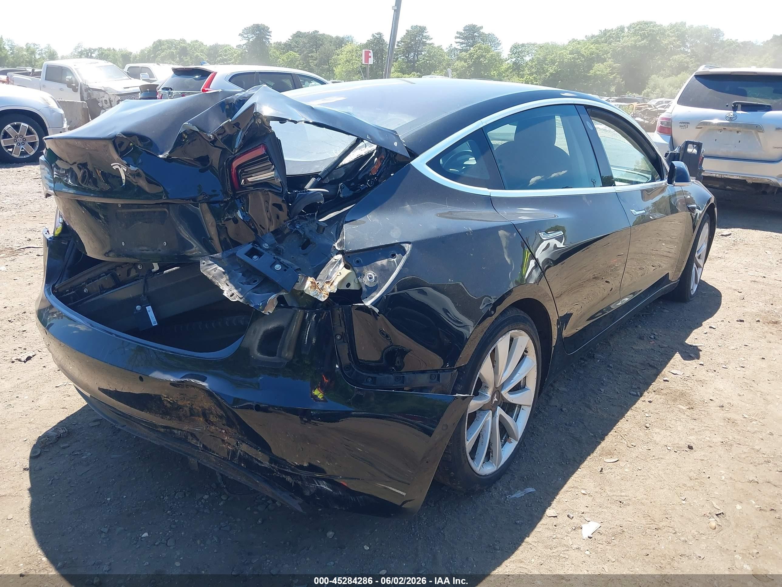 2018 Tesla Model 3 VIN 5YJ3E1EA5JF049736 IAAI salvage auction — Normal Wear, Clear (New York), sold $1,600 on 2026-06-30 (photo 6)