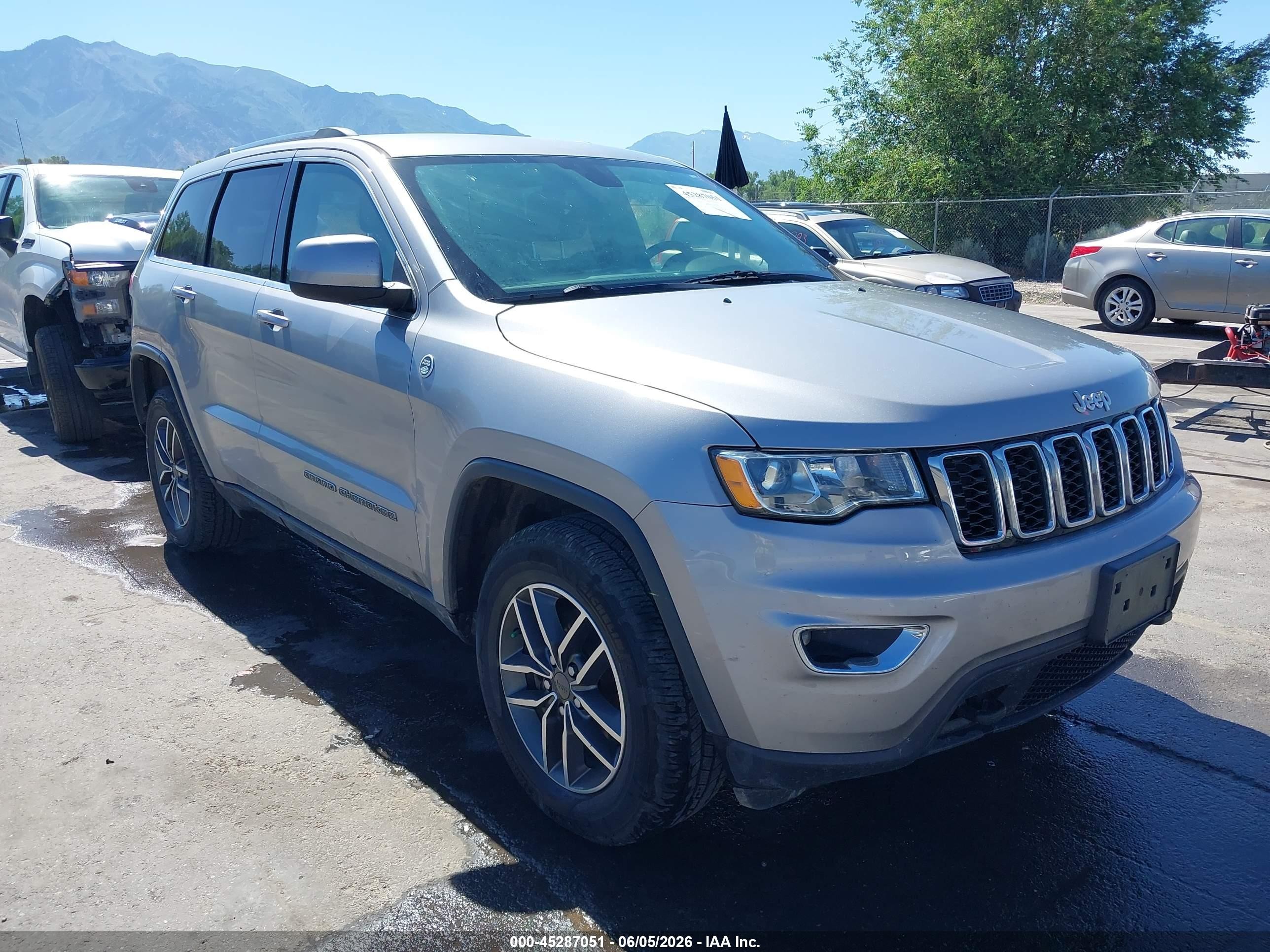 2019 Jeep Grand Cherokee VIN 1C4RJFAGXKC548124 — IAAI salvage auction photo