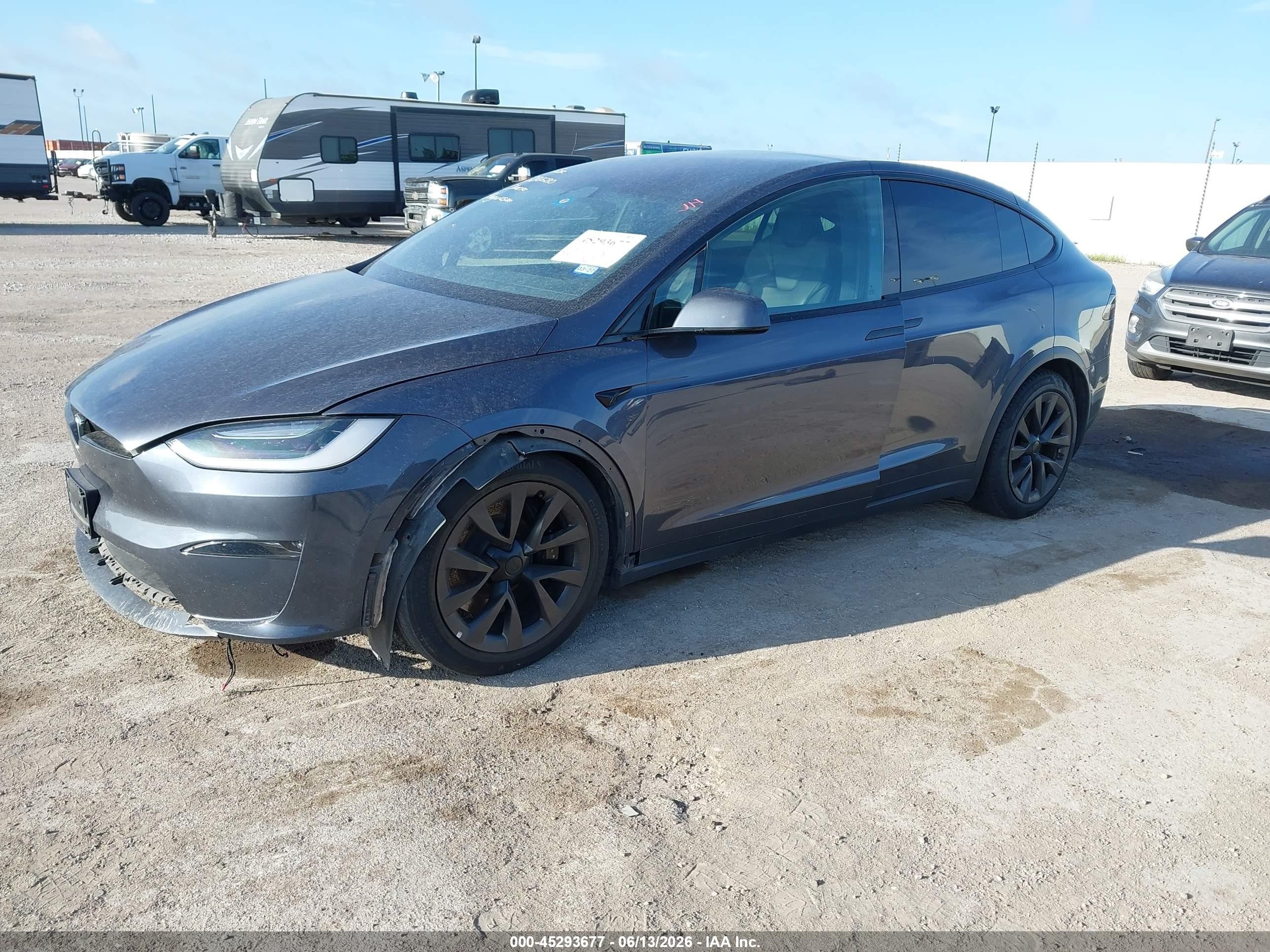 2023 Tesla Model x VIN 7SAXCAE54PF386680 IAAI salvage auction — Unknown, Original (Texas), sold $29,750 on 2026-08-15 (photo 2)